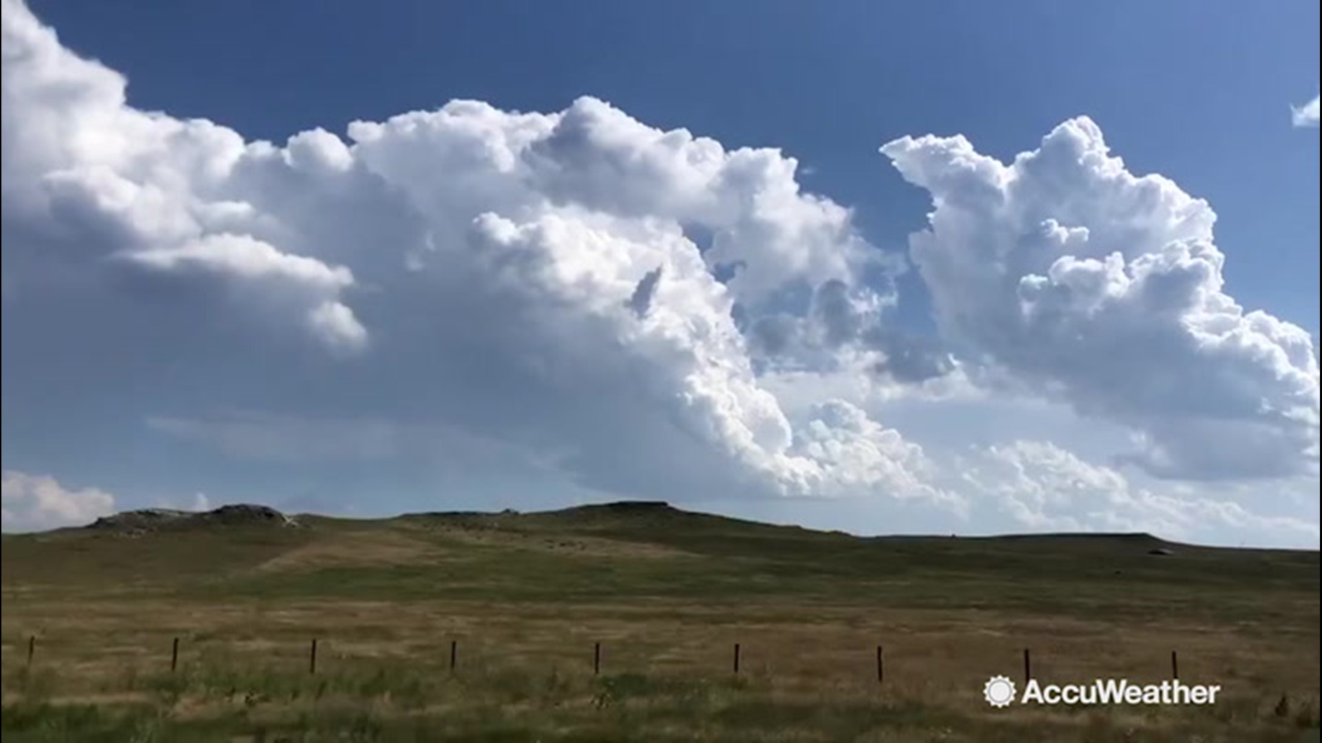 Giant cumulus clouds were spotted near Sidney, Nebraska on Aug. 14. The clouds are expected to bring severe thunderstorms to northeast Colorado as they mature.