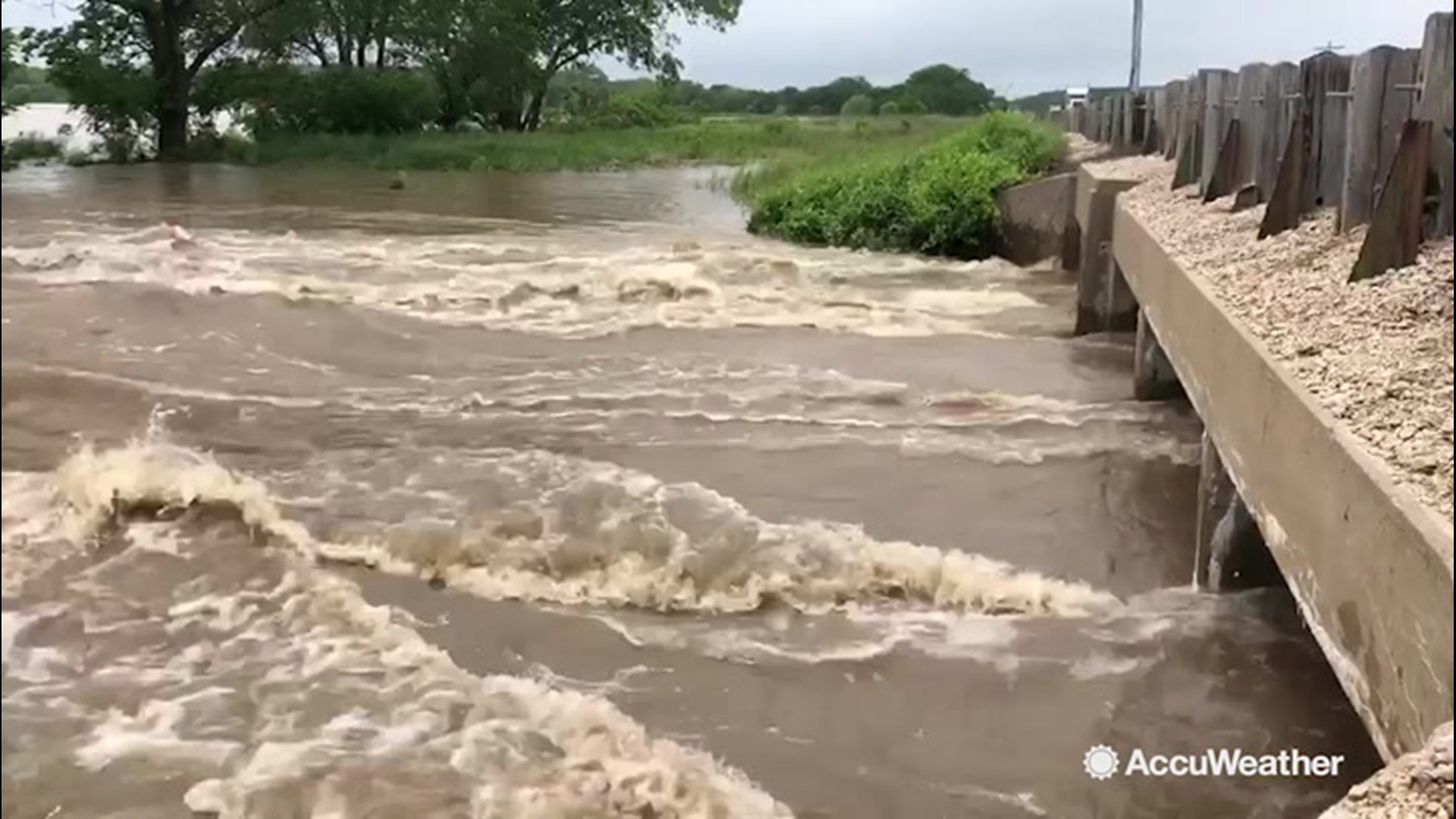 This creek along Highway 166 near Coffeyville, Kansas has turned into a raging river amid flash flood threats on May 22.