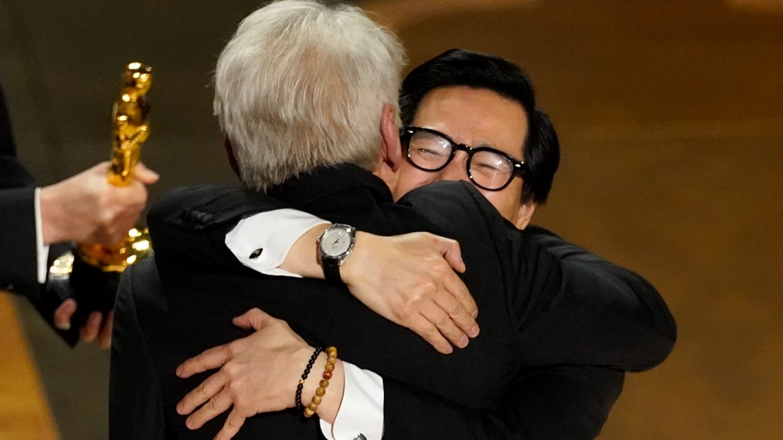 Harrison Ford, Ke Huy Quan hug at Oscars best picture win