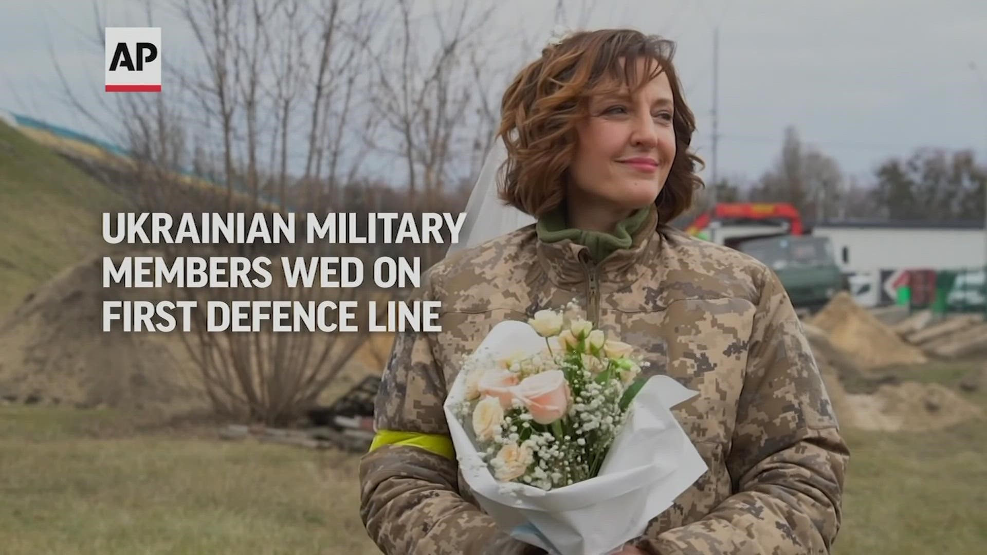 A Ukrainian couple who have been together for 22 years finally decided to get married... right on the defense line in Kyiv.