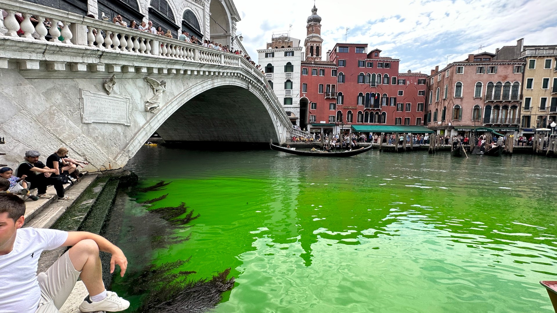 Italian police are investigating the source of a phosphorescent green liquid patch that appeared in the Grand Canal in Venice.