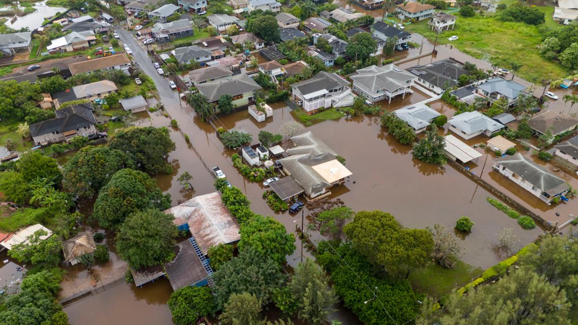 Dozens rescued as flooding hits Hawaii, with officials warning a 120-year-old dam could fail