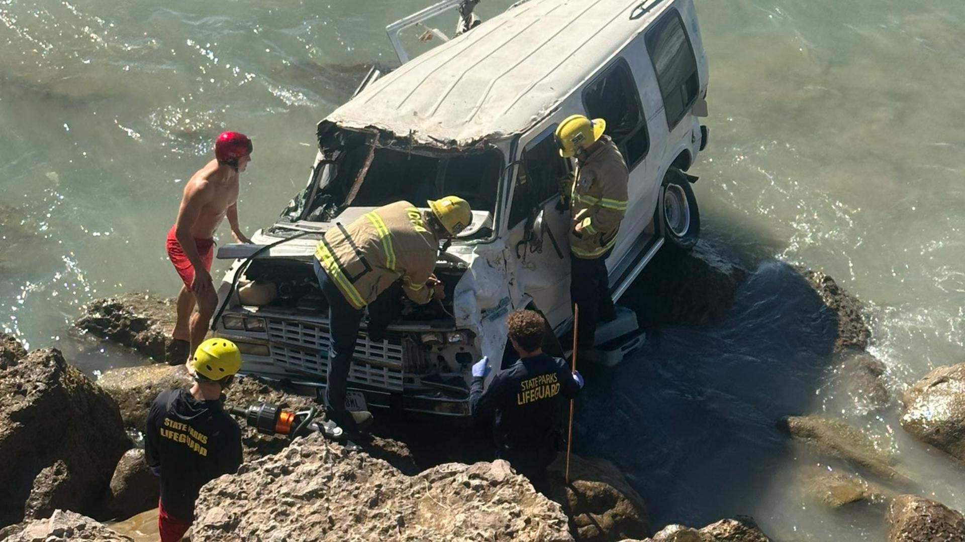 Firefighters, lifeguards rescue dog from car crash in California ...