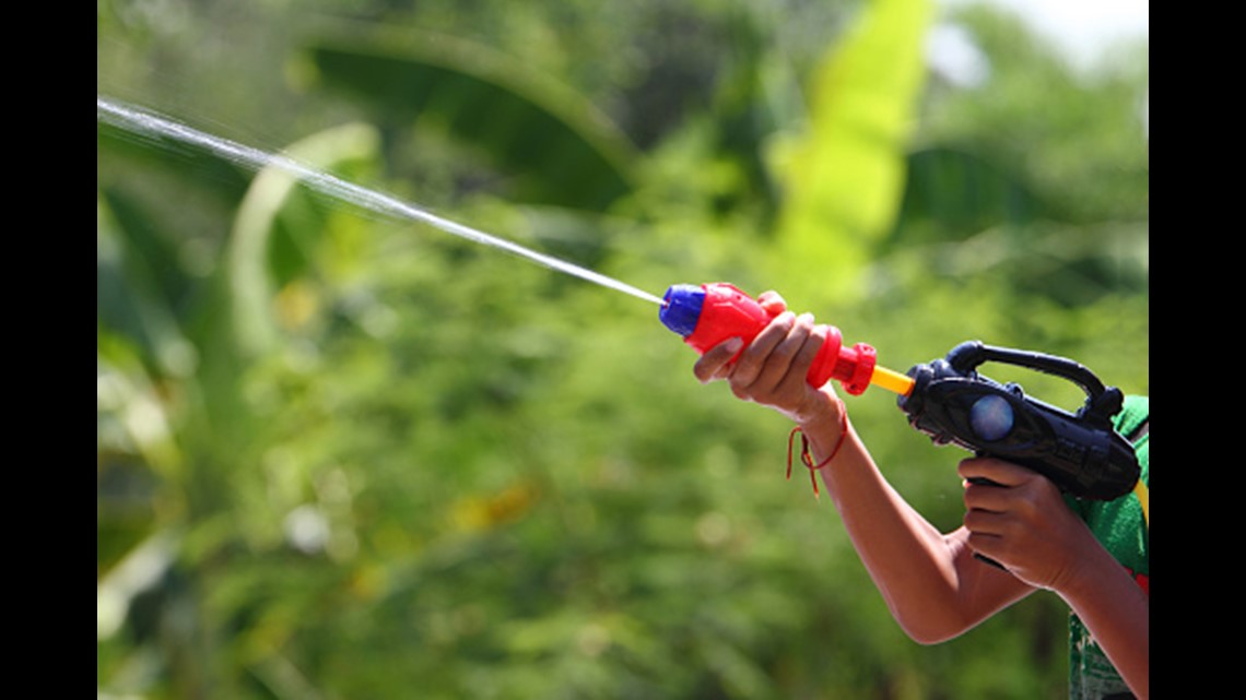 Elaborate squirtgun game has teens competing and running naked in the