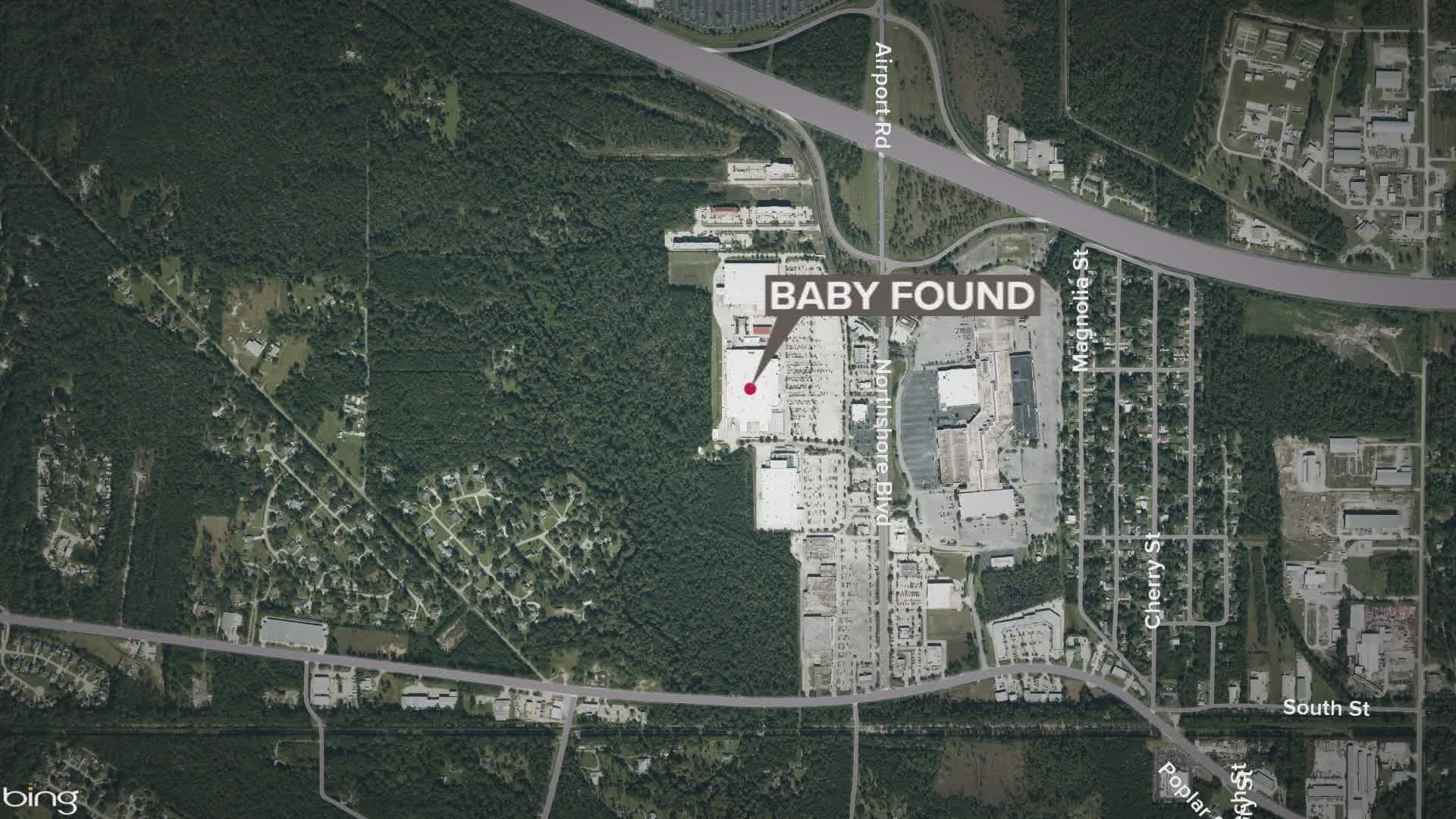 Officers found a two-week-old baby in a car, covered in a blanket with the air conditioning blowing hot air, police say.