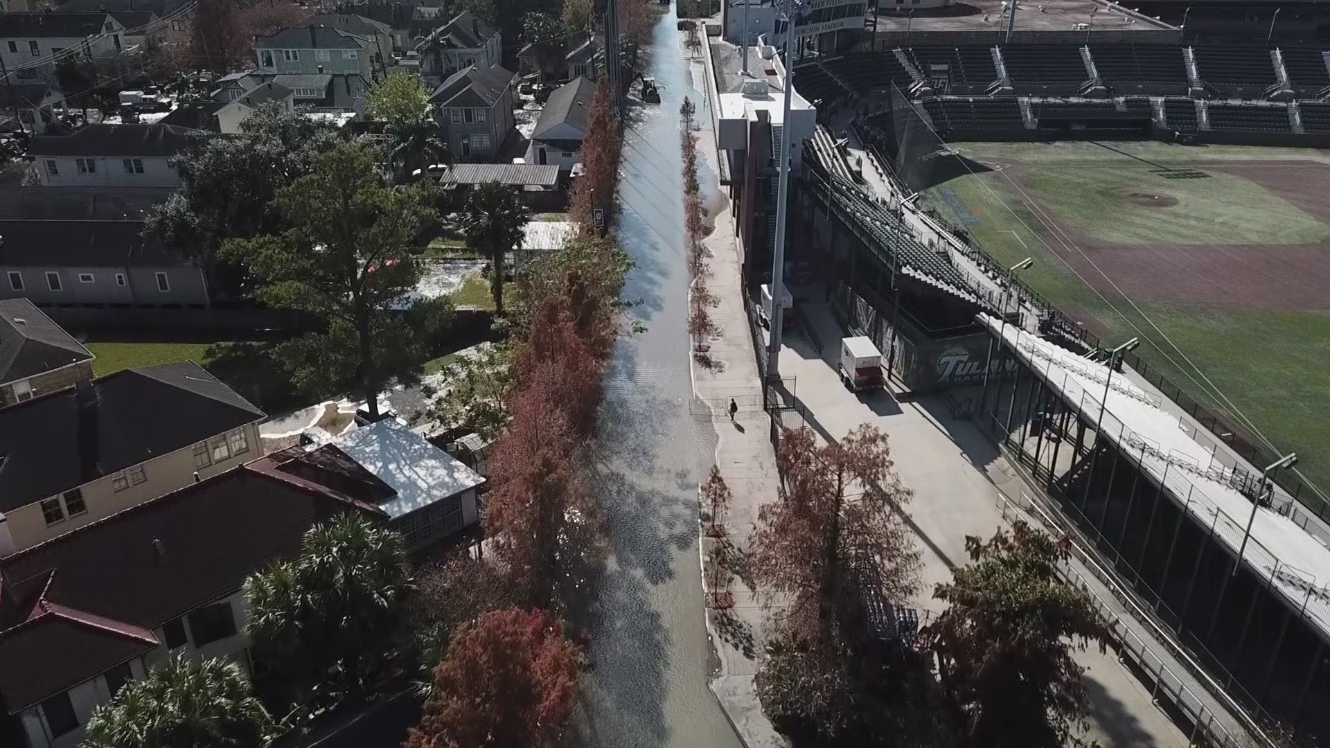 Rushing water from a broken 30-inch water main flooded blocks near Tulane University's Yulman Stadium Friday, dropping pressure and prompting a boil water alert.