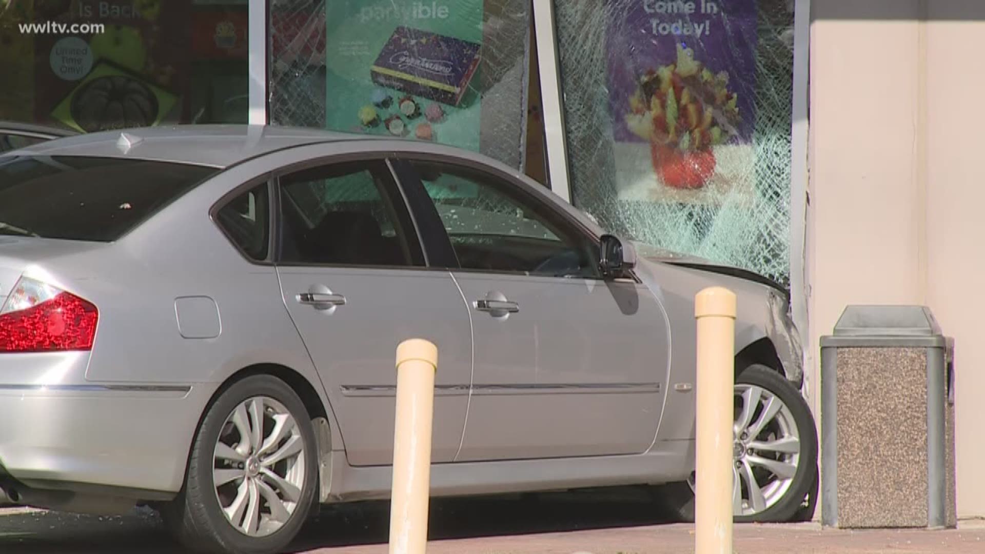 New Orleans Police are working to find out how a car wound up in an edible arrangements store.