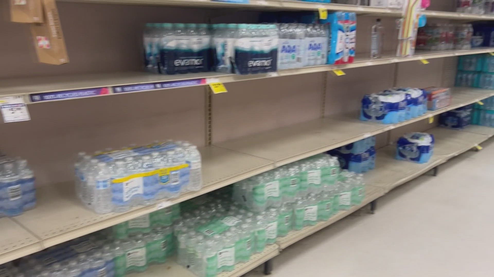 Around New Orleans, people hauled bottled-filled jugs and hung up signs as a massive boil advisory entered its second day.