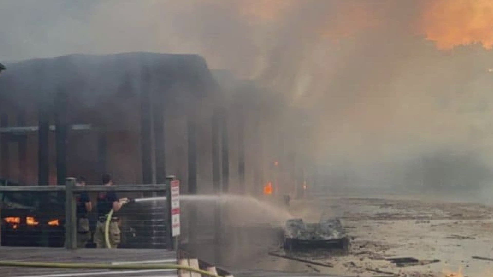 A section of woods separate the River Club area from the dock. St. Tammany Firefighter, Joey Sanders, said preventing the fire from spreading was a 'major concern.'