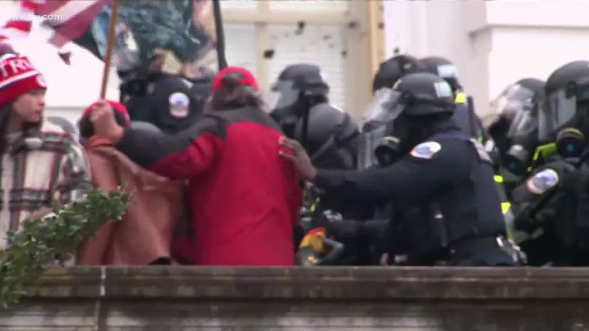 Some police officers appeared to either allow protesters to go into the Capitol or took selfies with protesters at last week's attack.