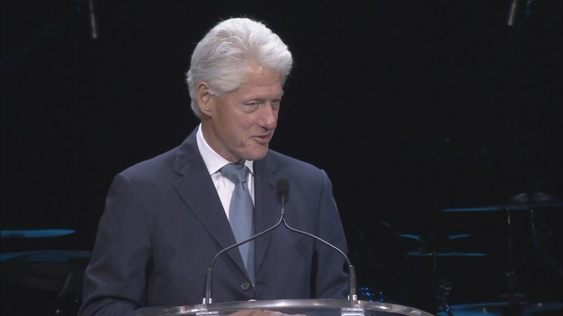 Bill Clinton addresses the crowd at Katrina 10-year commemoration event at the Smoothie King Center.