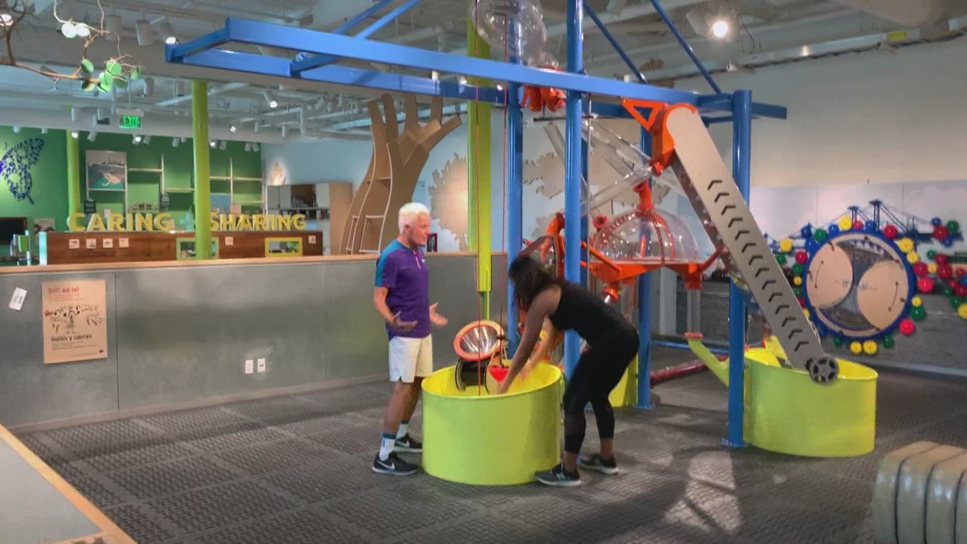 Mackie and April show us shoulder excercises while giving a glimpse inside the LA Children's Museum