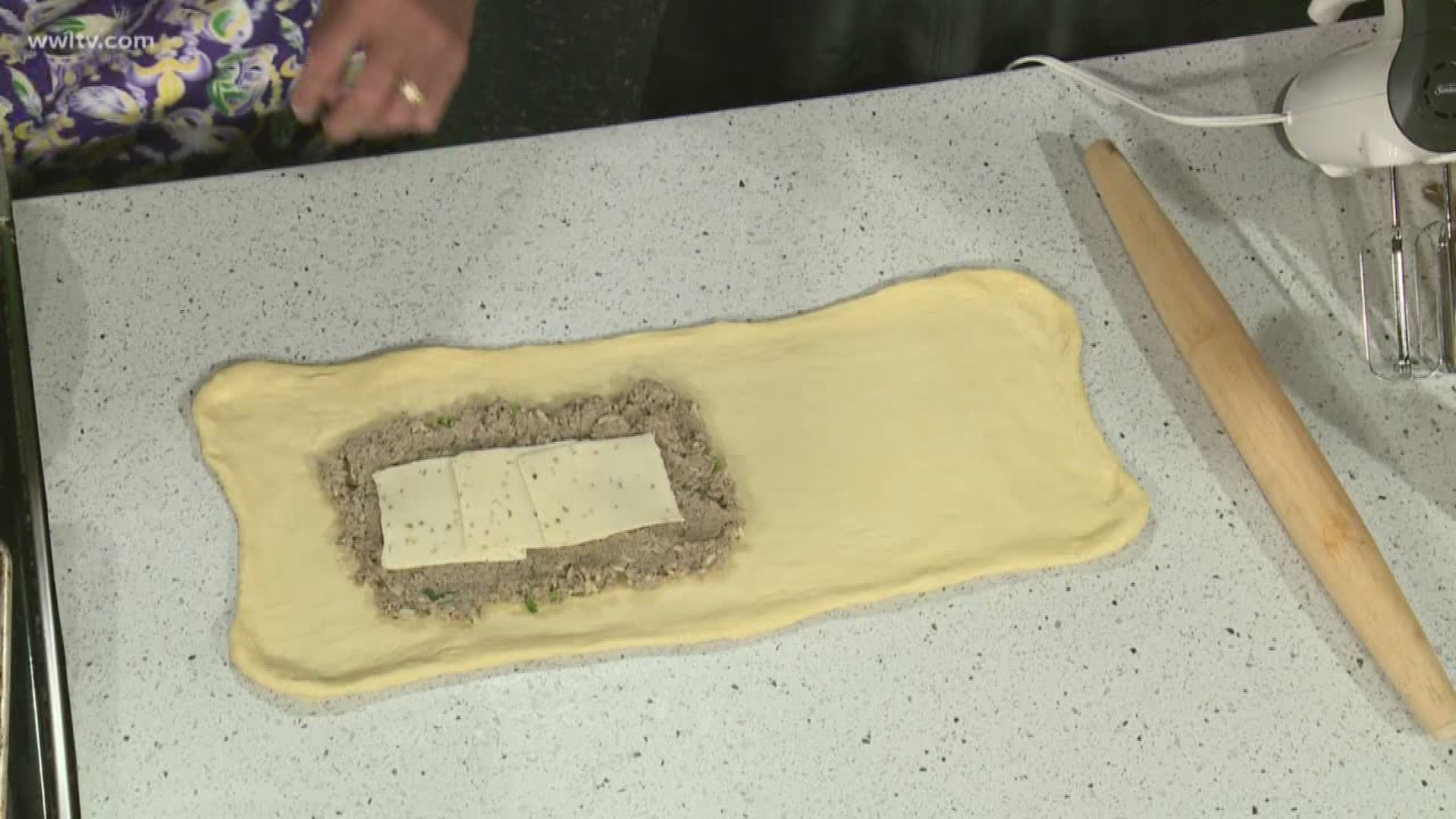 Chef Kevin is in the kitchen with a unique Savory Boudin King Cake.