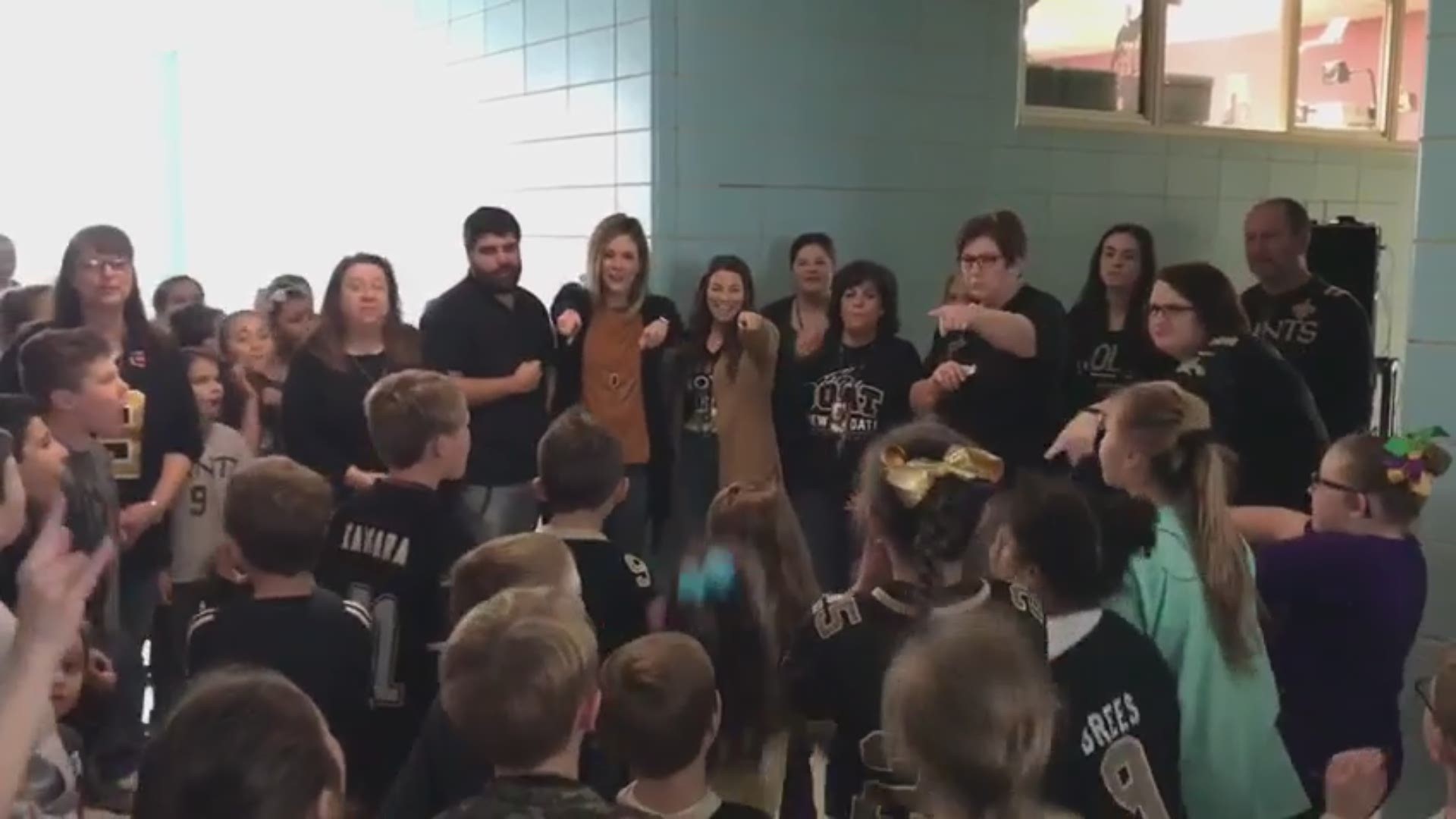 Some Who Dat fans held a pep rally at Holy Savior Catholic School in Lockport.