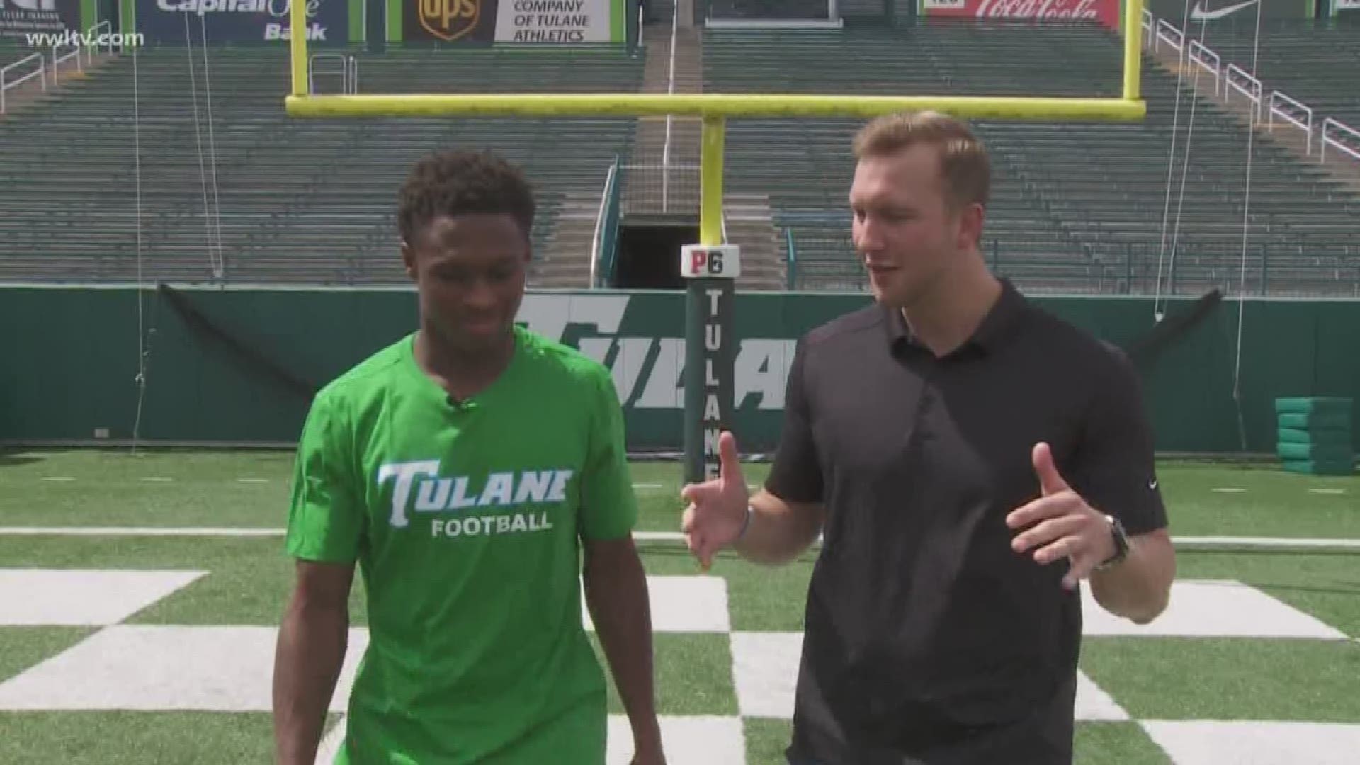Eyewitness Sports Reporter Andrew Doak walks 100 yards with Tulane Green Wave wide receiver Darnell Mooney.