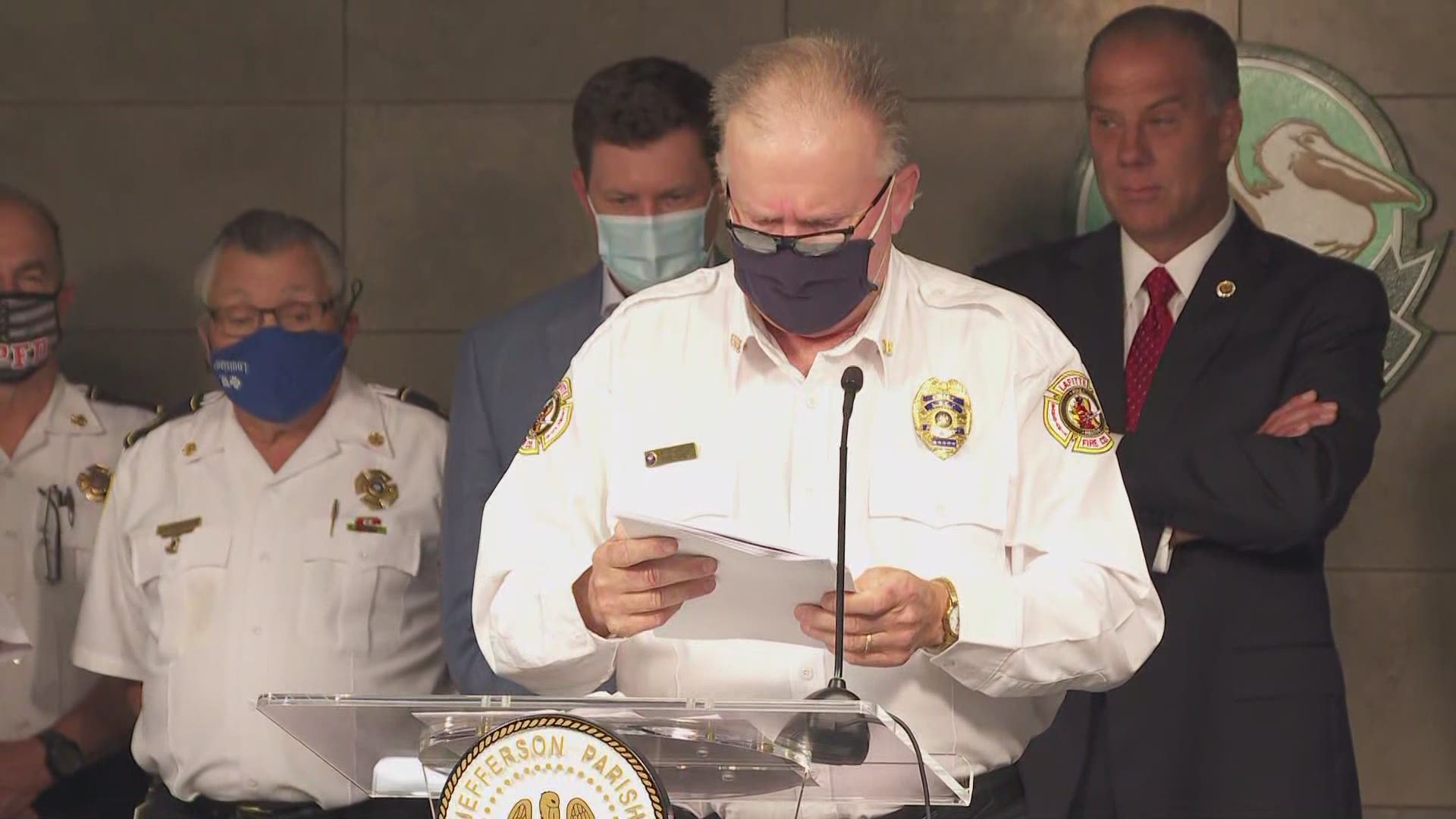The Lafitte Fire Department Chief Linton Duet gets emotional as he reads that his office has received the highest classification possible for fire safety.