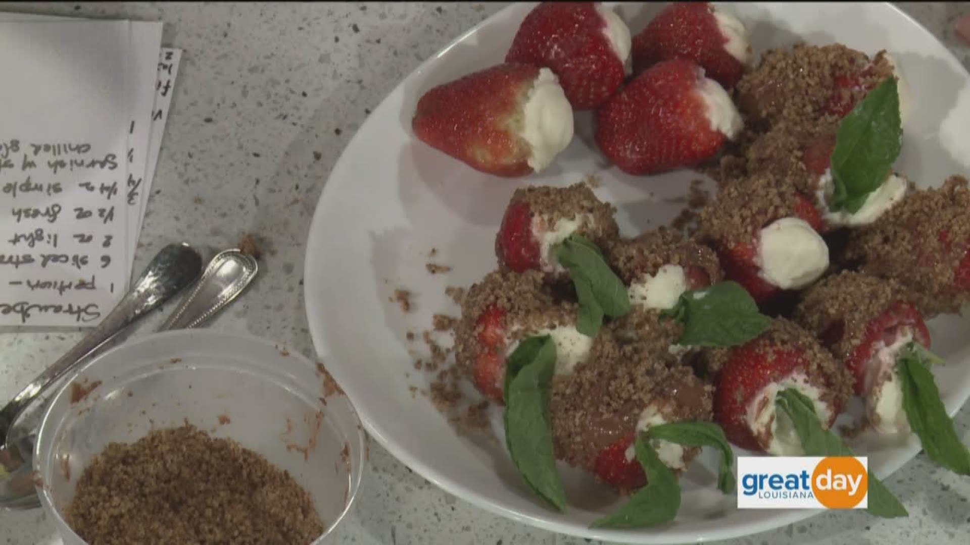 NOLA Grandmas Anne and Harriet are back in the kitchen making pecan and chocolate-encrusted stuffed strawberries paired with a classic strawberry daiquiri.