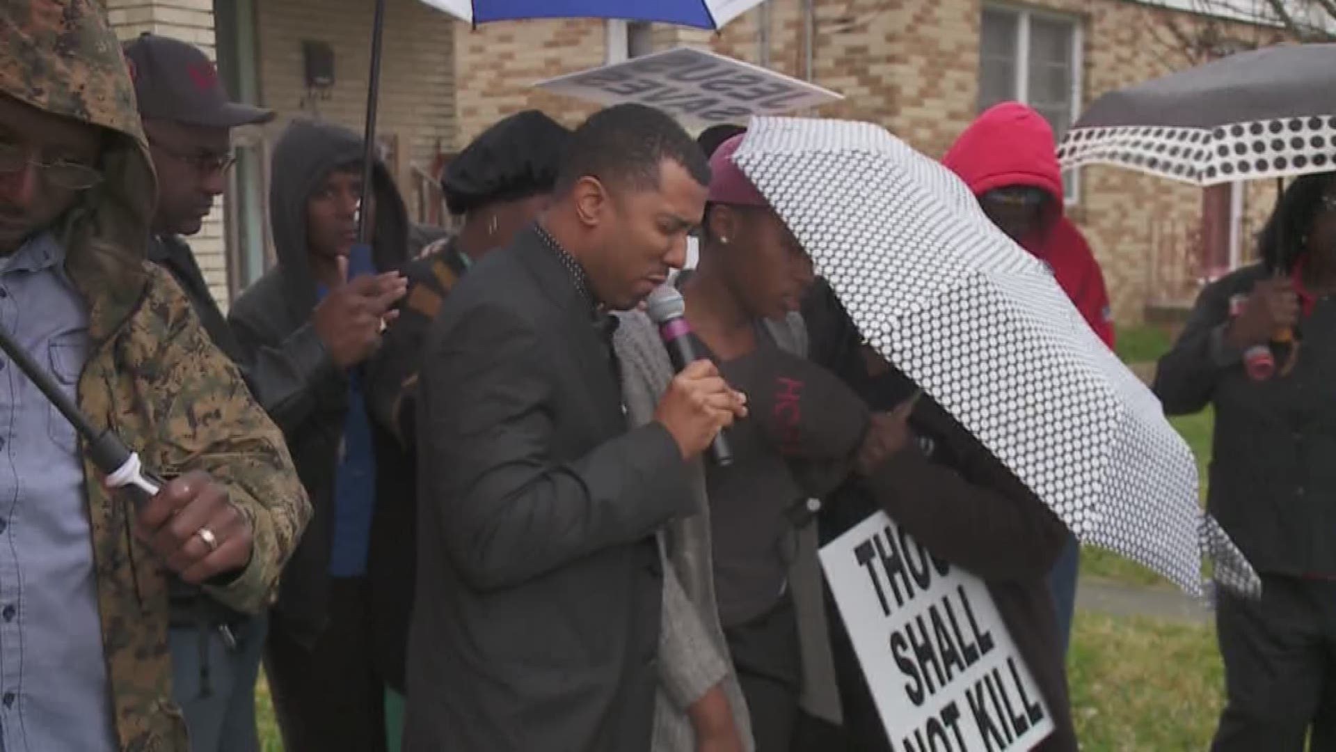 Caresse Jackman talks to members of a family gunned down in Gentilly.