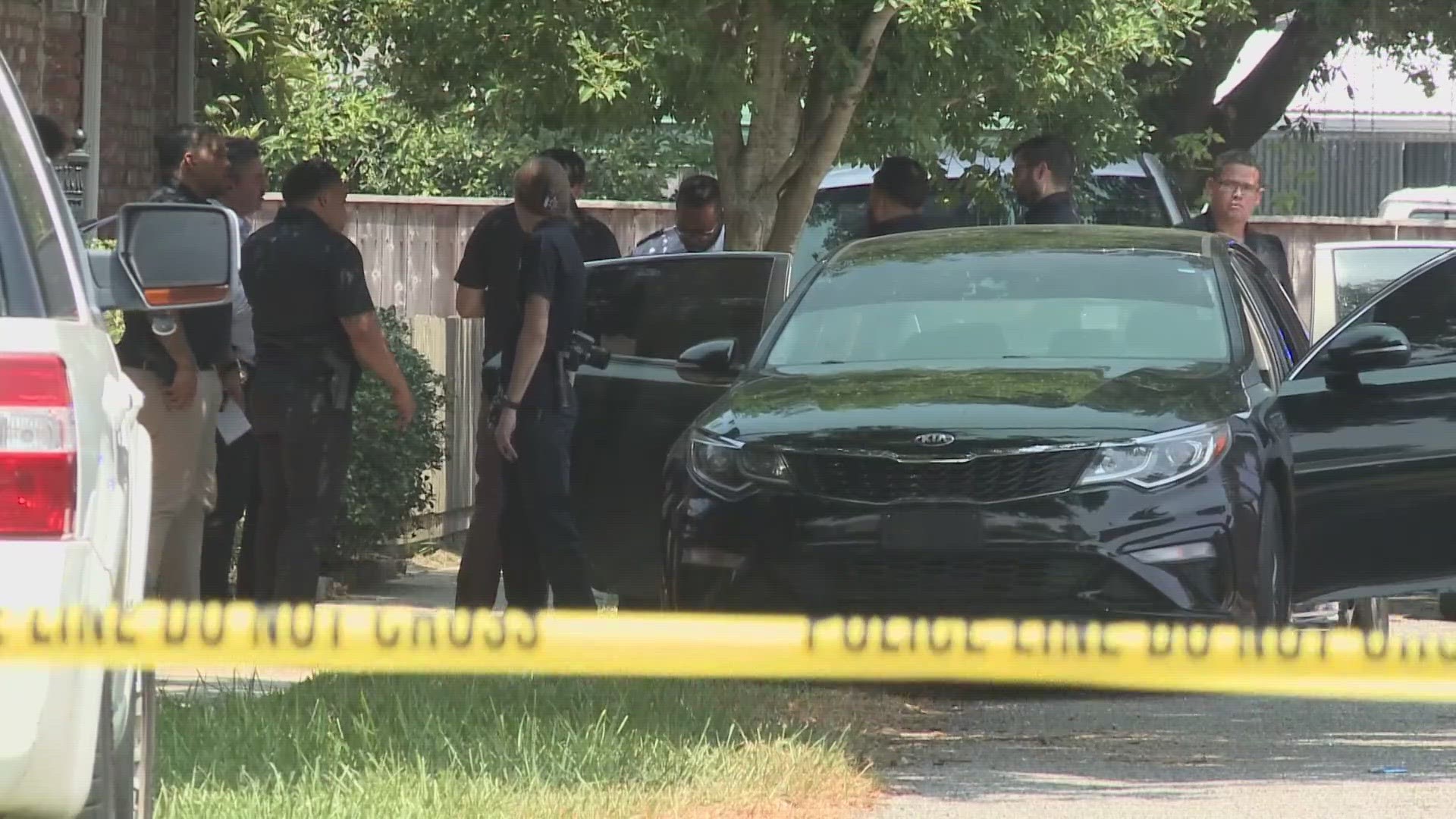 Police say they found an unidentified black male with multiple gunshot wounds inside a black Kia Optima near Berg Road in 11000 block of Wales Street around 12:30 p.