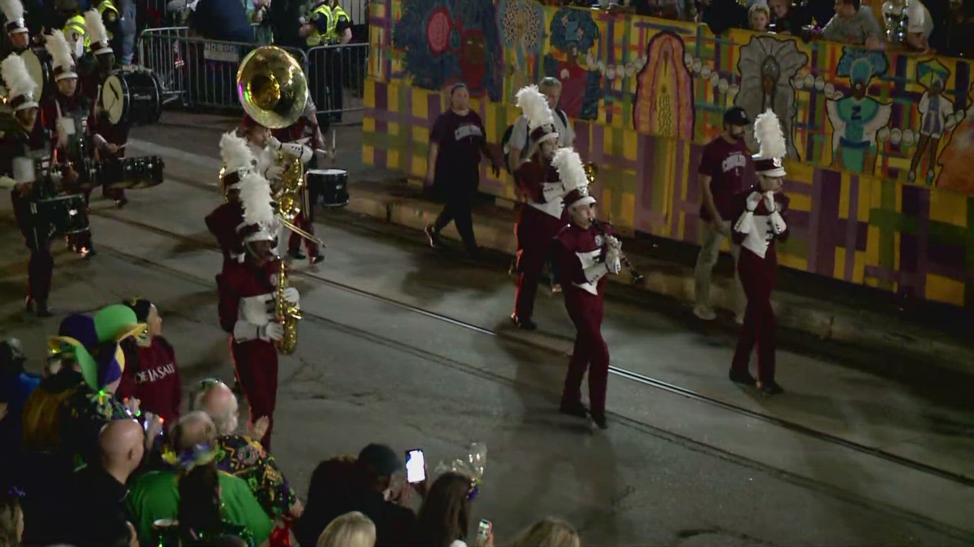 De La Salle High School Marching Band makes its way past Gallier Hall