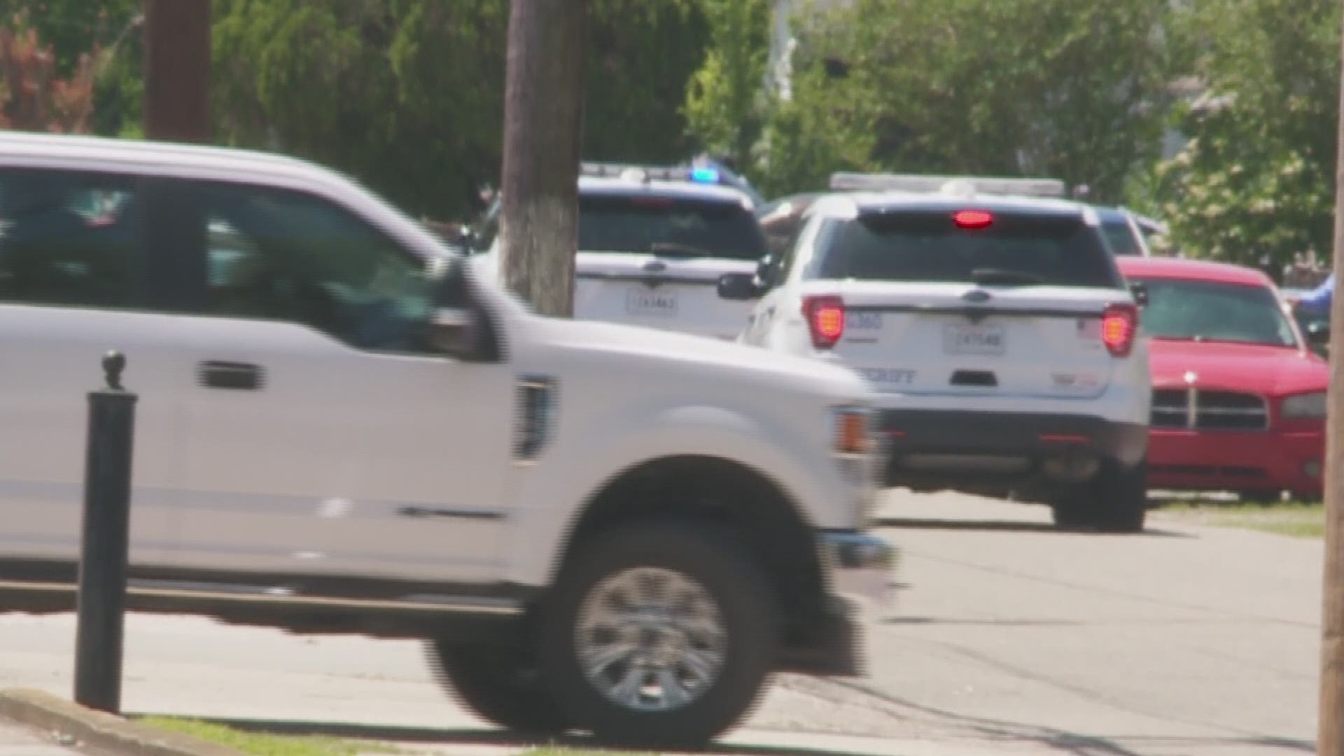 One person is reportedly in custody and another wanted following a shootout and standoff with a SWAT team in Metairie on Tuesday morning.