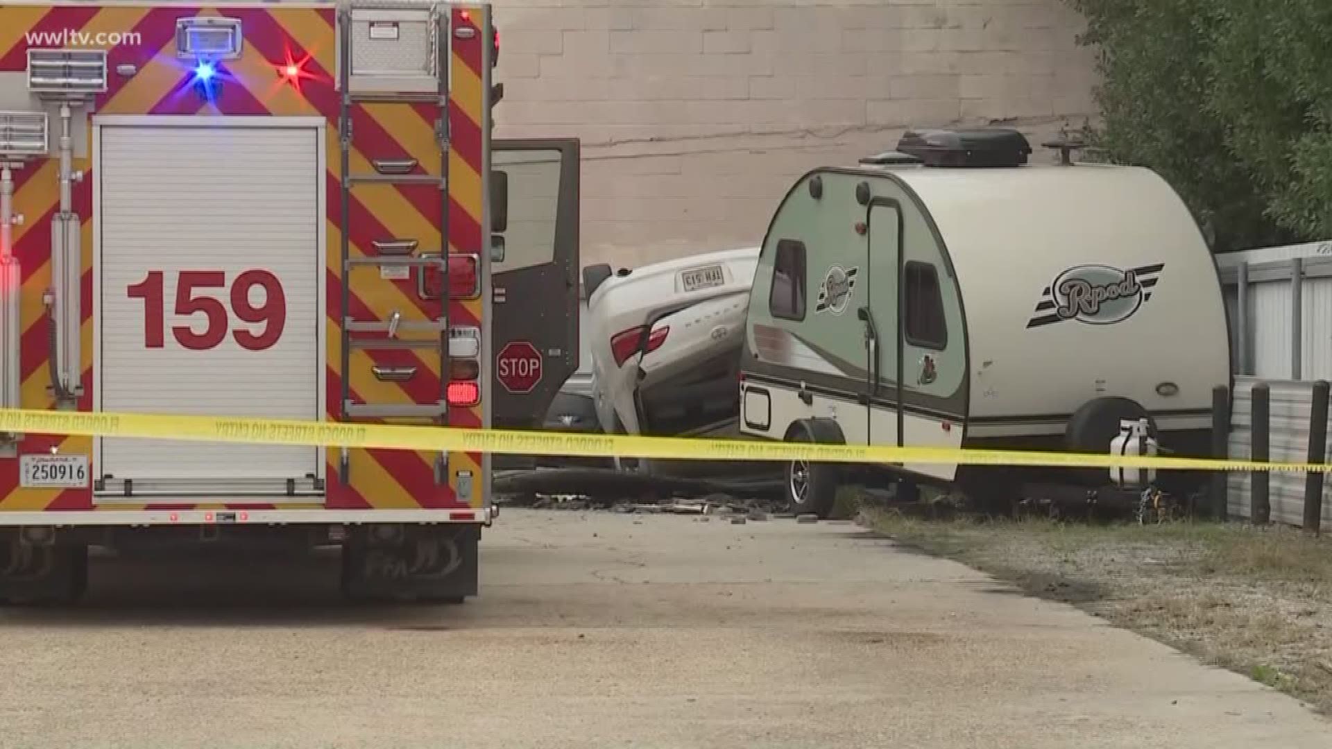 Officials are still unsure how the car went off the side of the two-story parking garage in Metairie