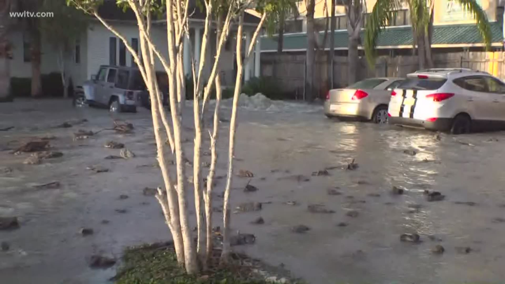 Water gushing uptown from a broken main was creating headaches for students and residents near Tulane's Yulman Stadium on Claiborne Avenue Friday.