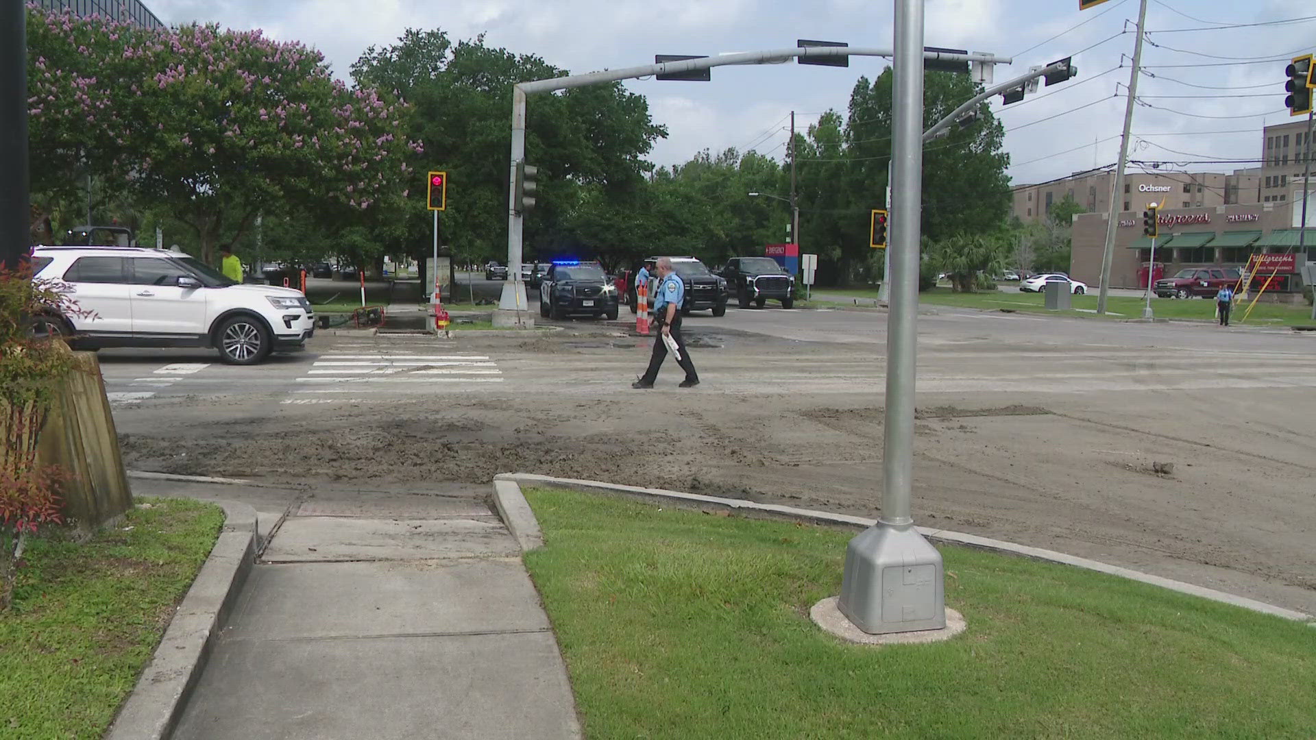 A Kenner intersection is closed as crews repair a broken and leaking water main.