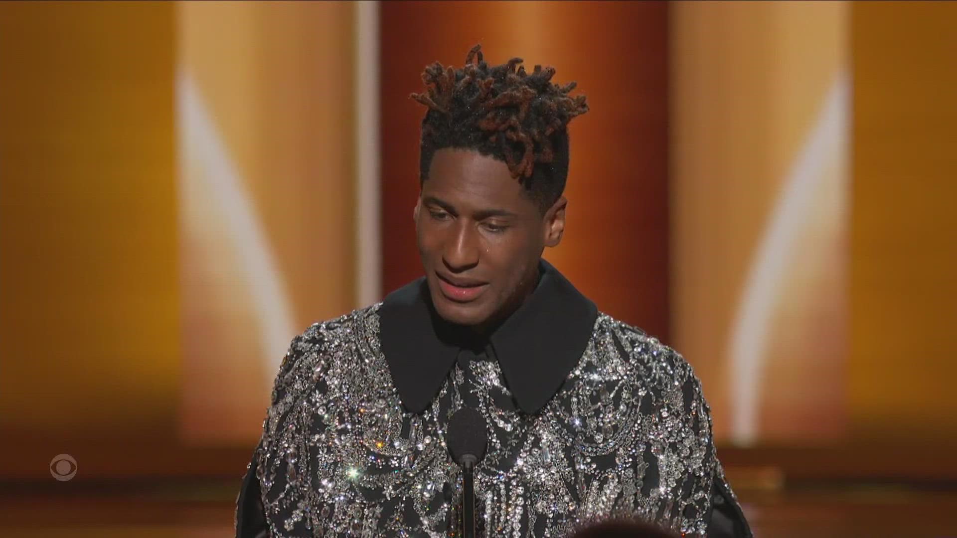 Jon Batiste won album of the year honors for “We Are” at the Grammy Awards on Sunday, giving him five trophies on the night.