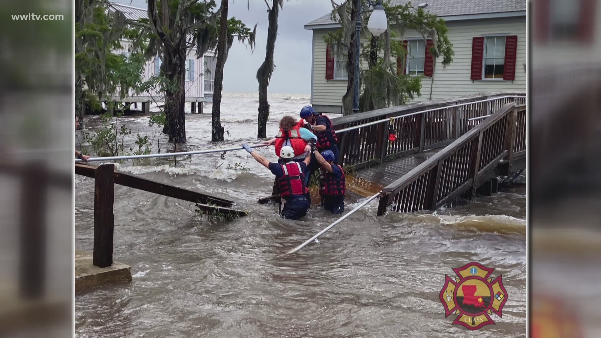 Between 10 and 12 people were rescued from a cabin that had its wooden walkway washed away by Cristobal floodwaters.