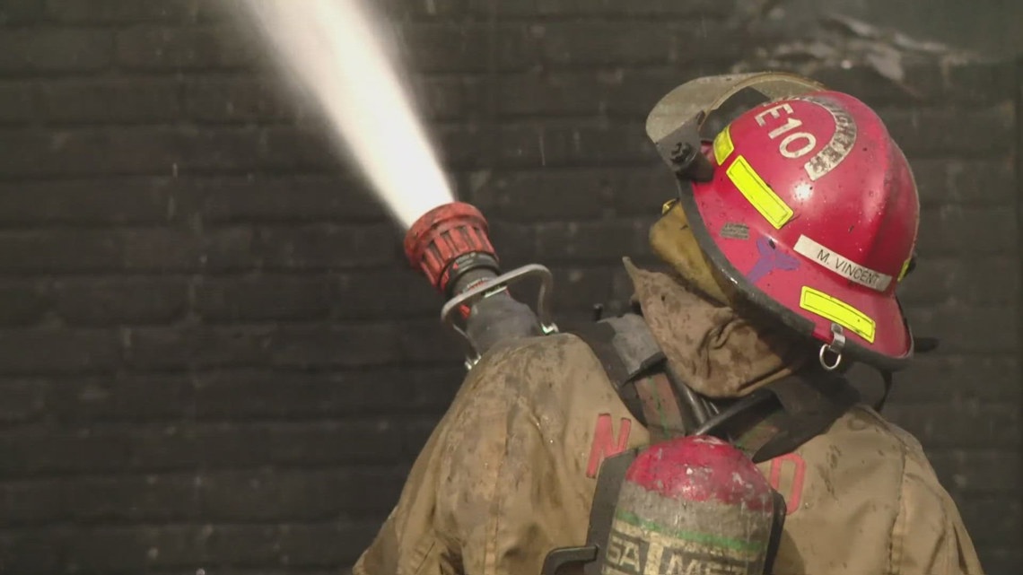 Woman rescued from second-story window during two-alarm apartment fire in New Orleans