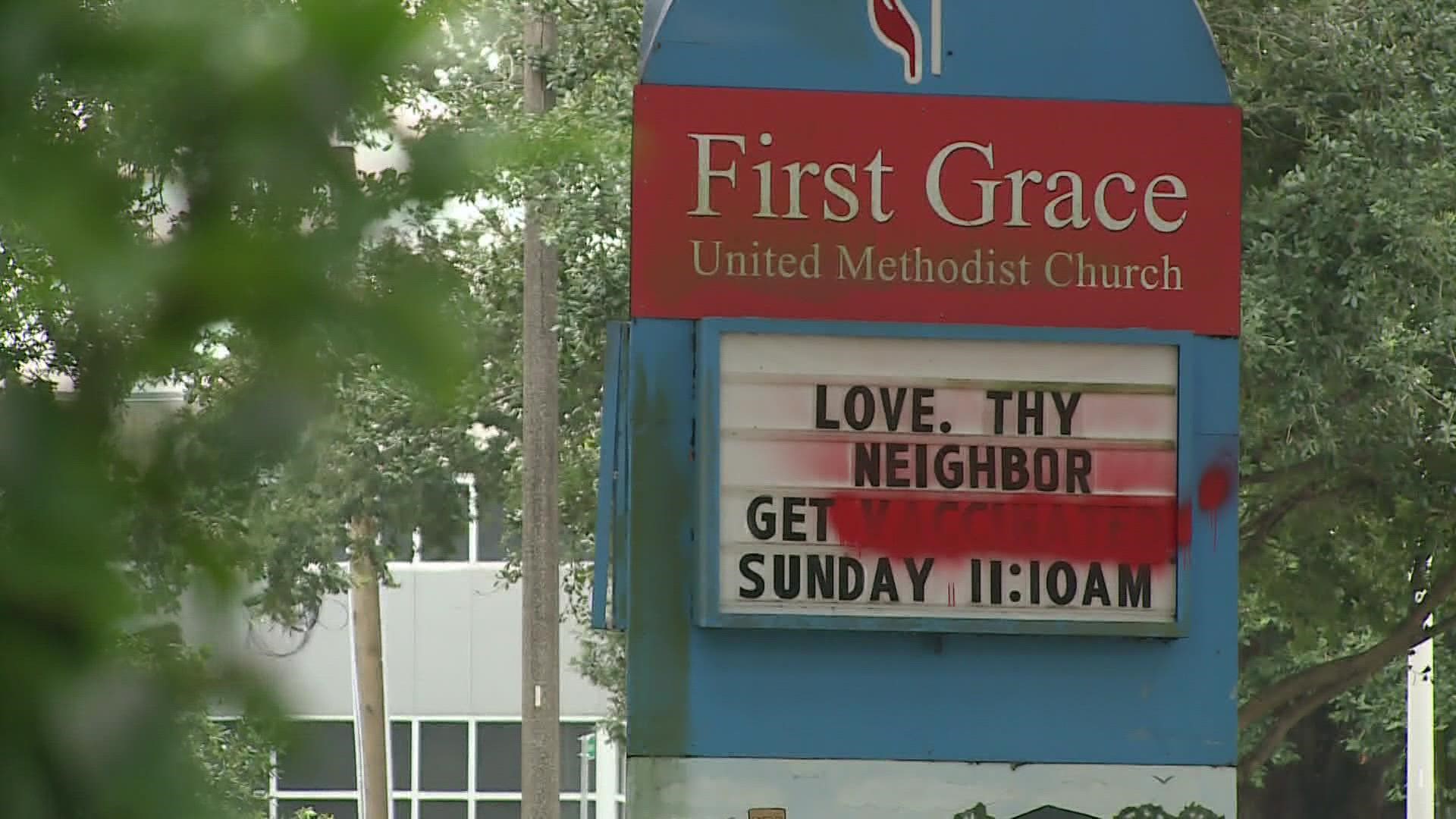 The pastor of a church said he is willing to talk to the person that spray-painted over his church's sign, promoting the covid vaccine.