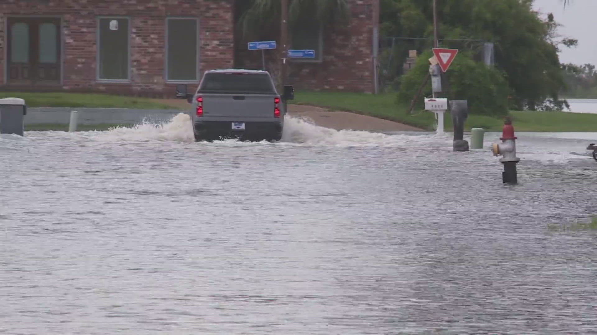 High winds and tides have pushed water over some of Louisiana's coastal roads from Tropical Storm Alberto.