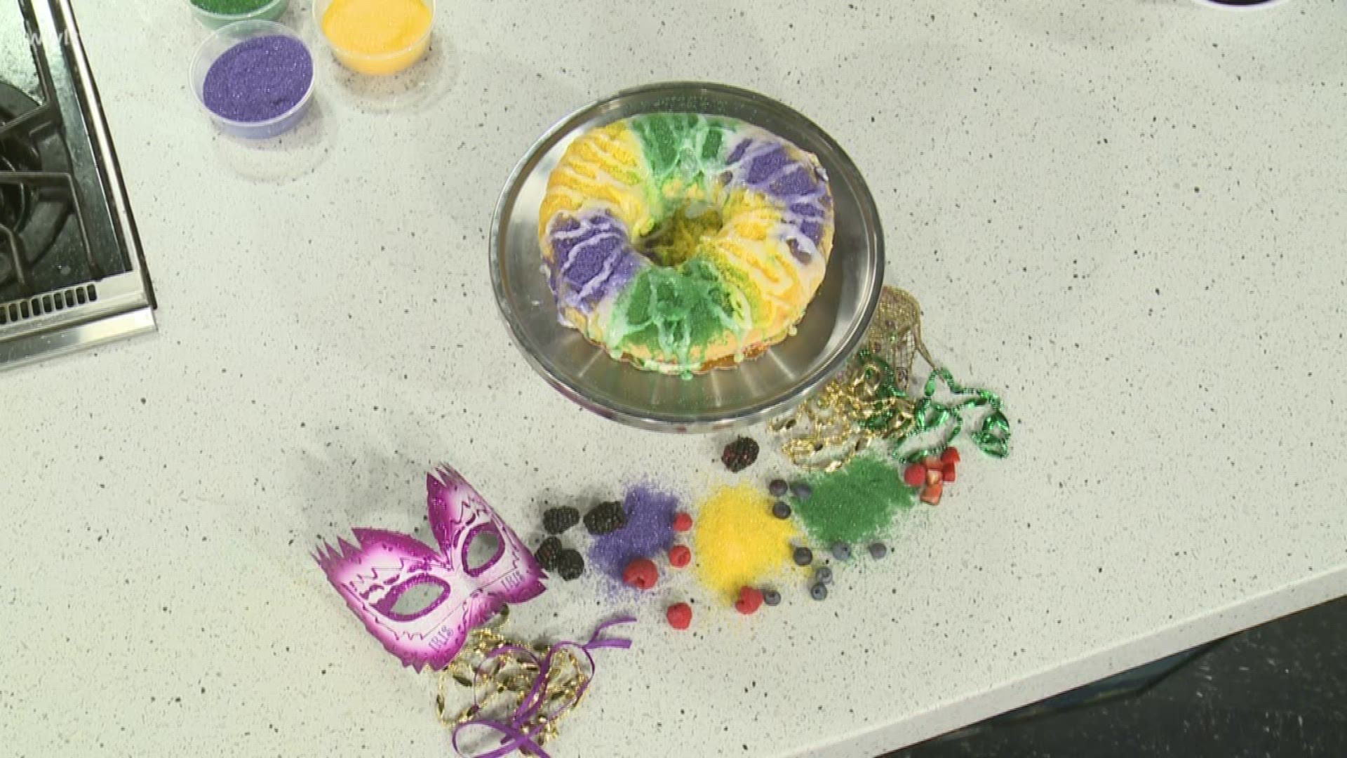 We are in the kitchen with Chaya Conrad getting a taste of Bywater Bakery's famous Chantilly King Cake.