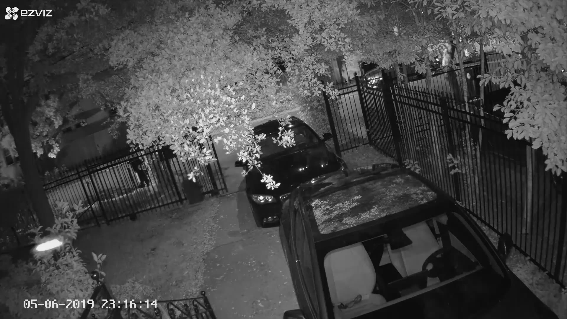 The burglary occurred just after midnight on May 7. According to police, four-to-five suspects jumped a 7-8 foot iron fence and stole from a vehicle parked in the driveway.