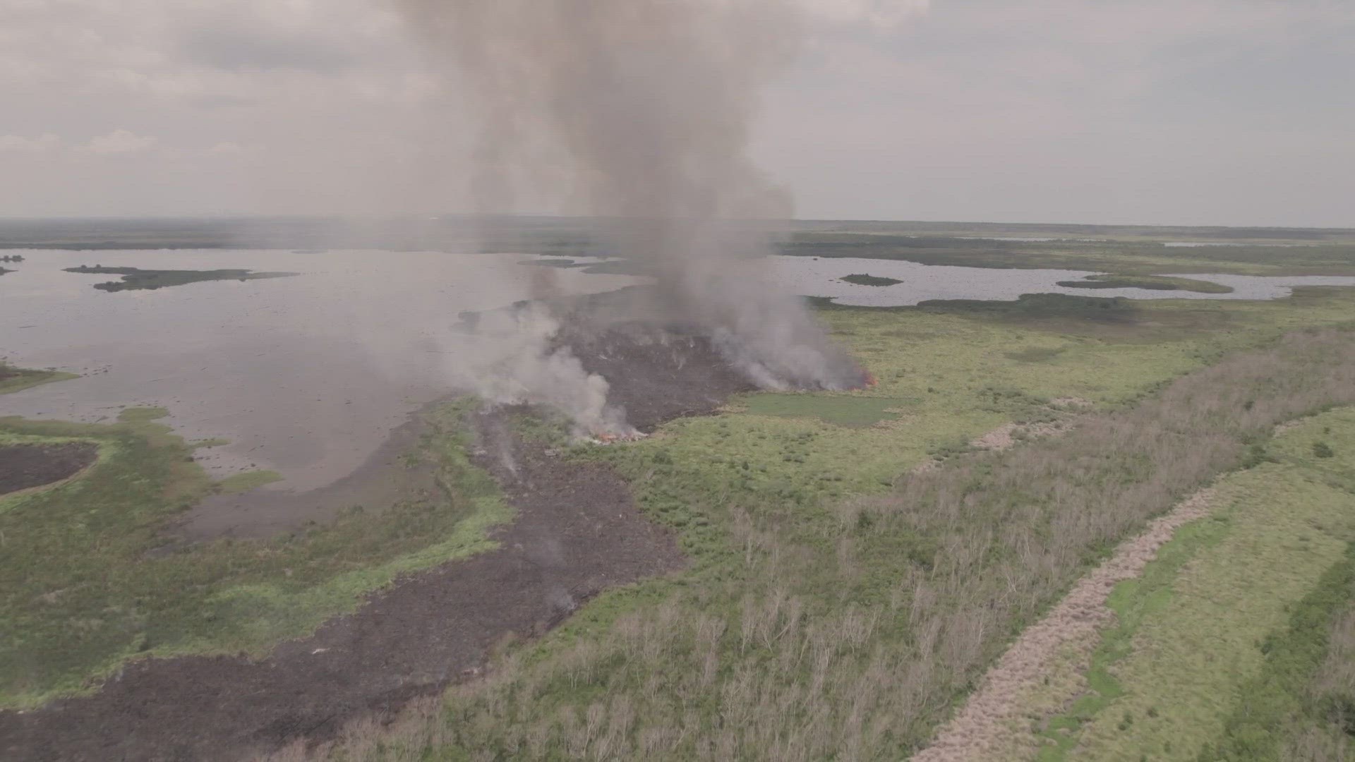 Wildfires continue to rage on in New Orleans East, including an ongoing marsh fire from the weekend as well as a secondary underground fire threatening homes.