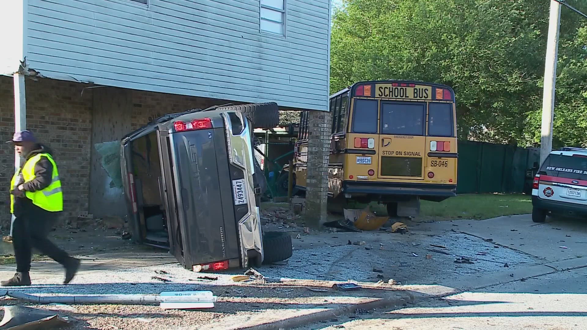 A school bus with about a half dozen students on board collided with a pickup truck but none of the students were injured.