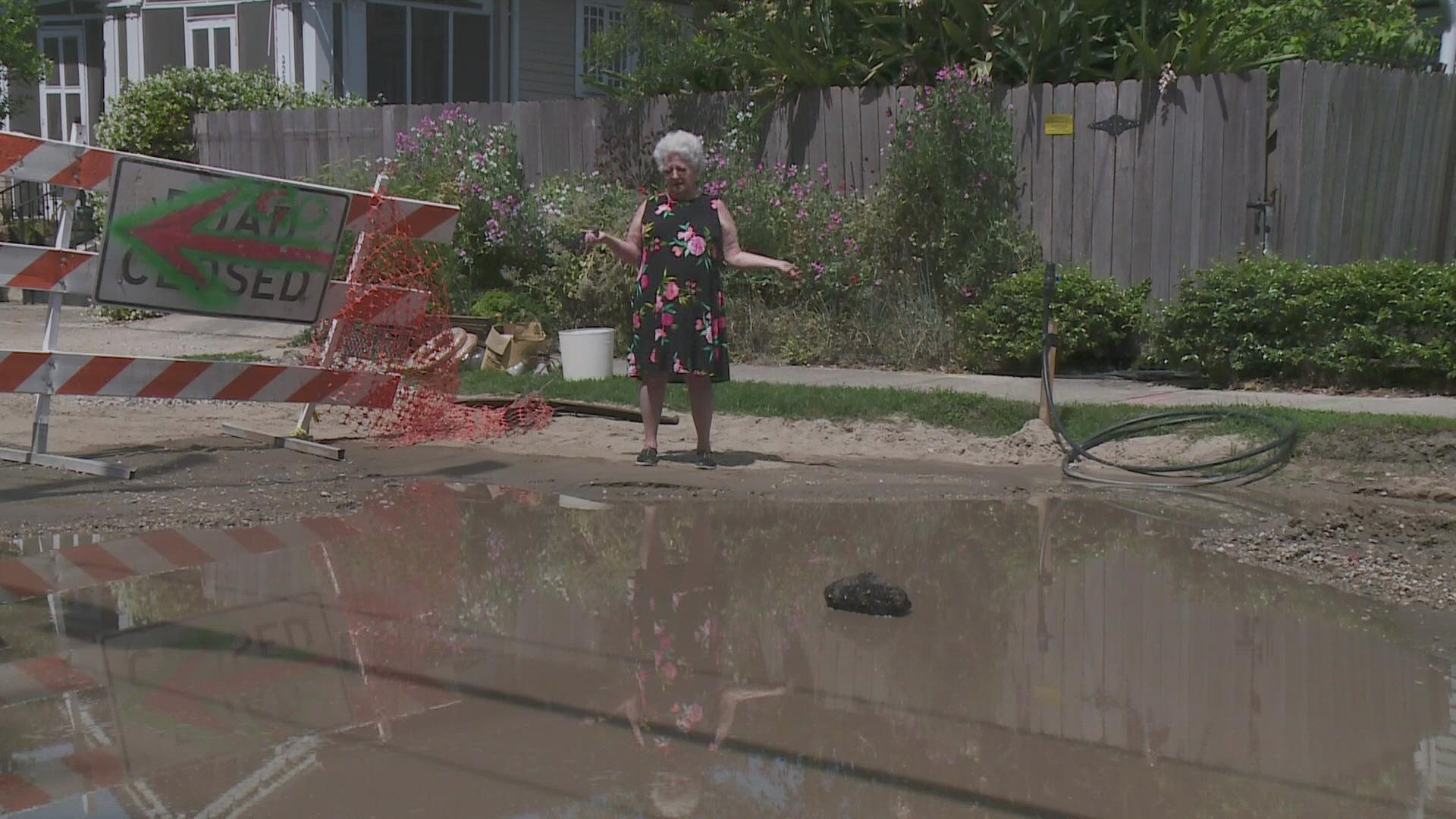 After five months of roadwork, large sinkholes full of water have appeared on Burdette Street between Neron Place and Sycamore Street