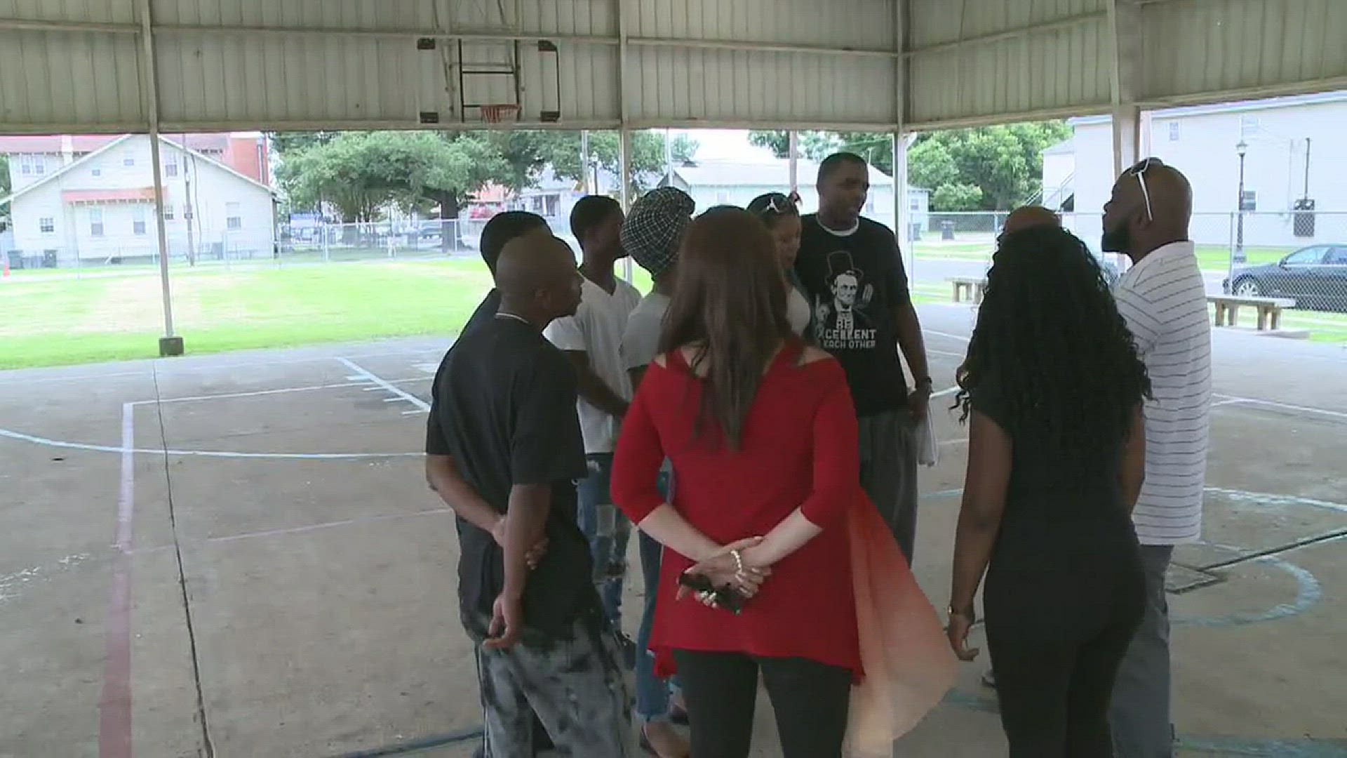 Meg Farris talks to a group about how they are Taking a Stand against crime in Algiers