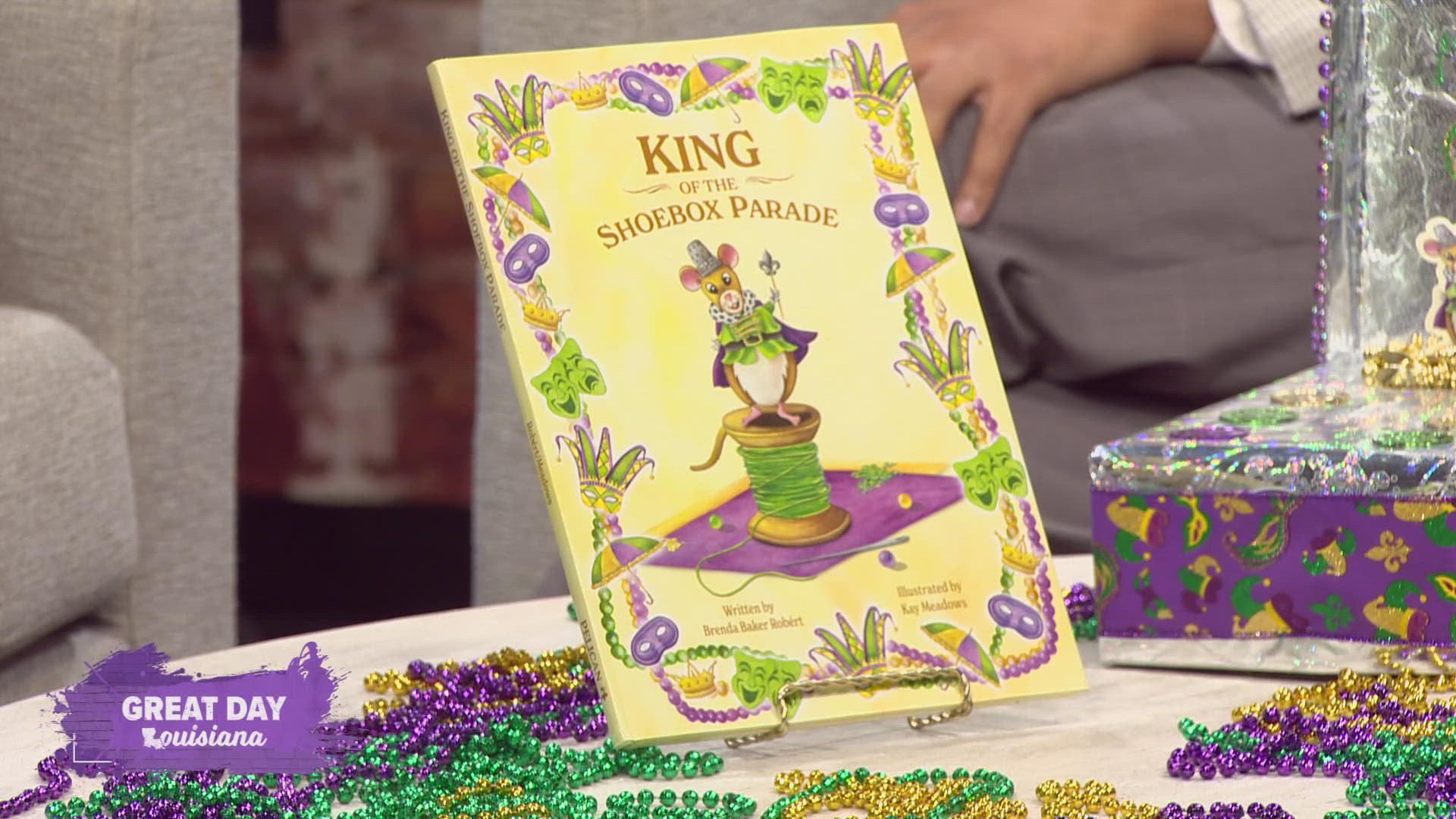 The author of the new book, "King Of The Shoebox Parade" that focuses on a beloved carnival tradition and teaches kids about kindness.