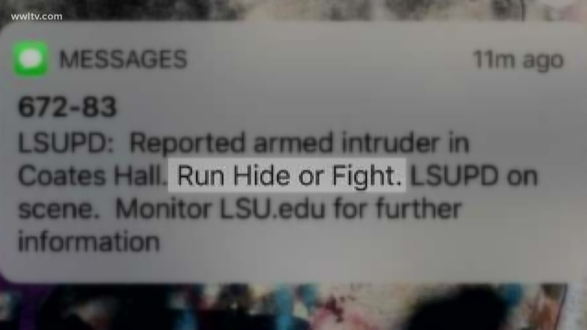 LSU University spokesman Ernie Ballard said that an armed plainclothes officer with a gun on his waist was in the area near the time of the report, and the school says that may have been the cause of the report.