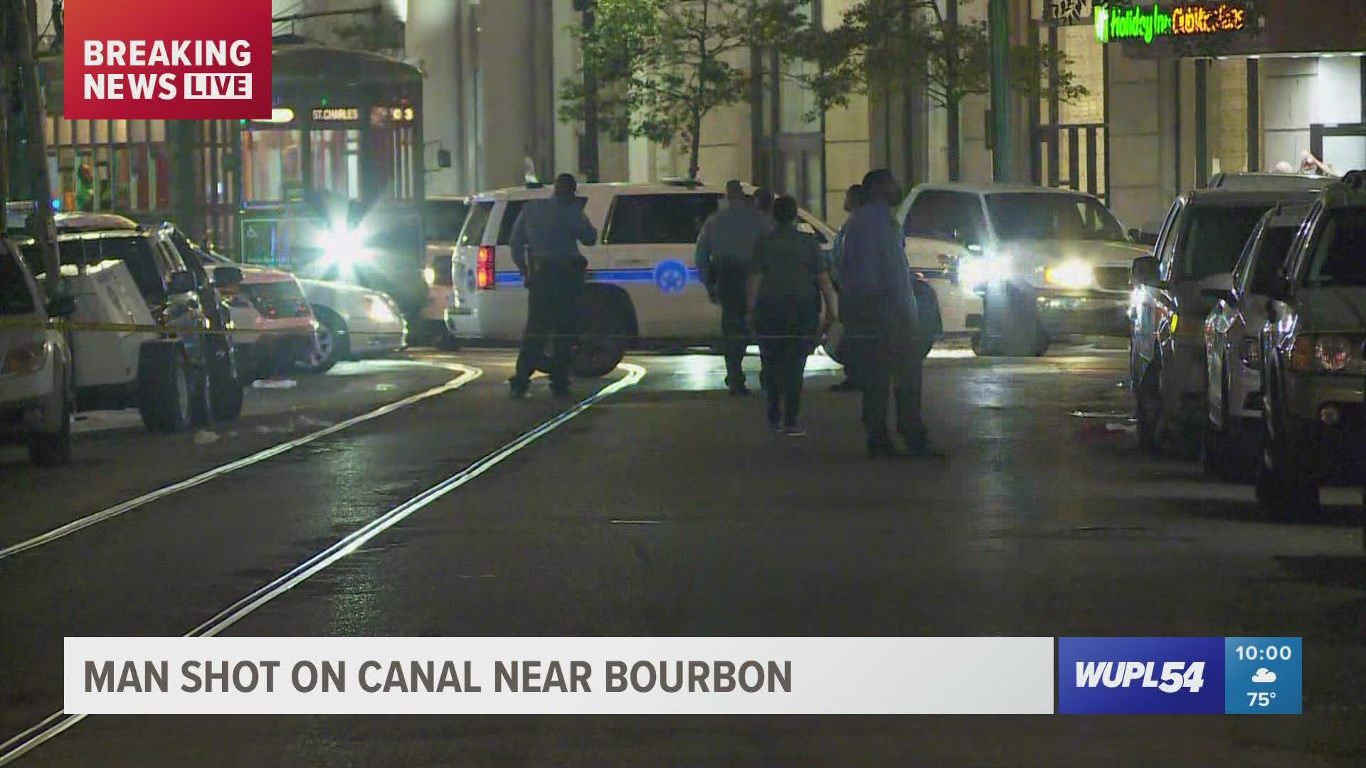 Three people were shot in an incident near Canal and Carondelet streets Friday night.