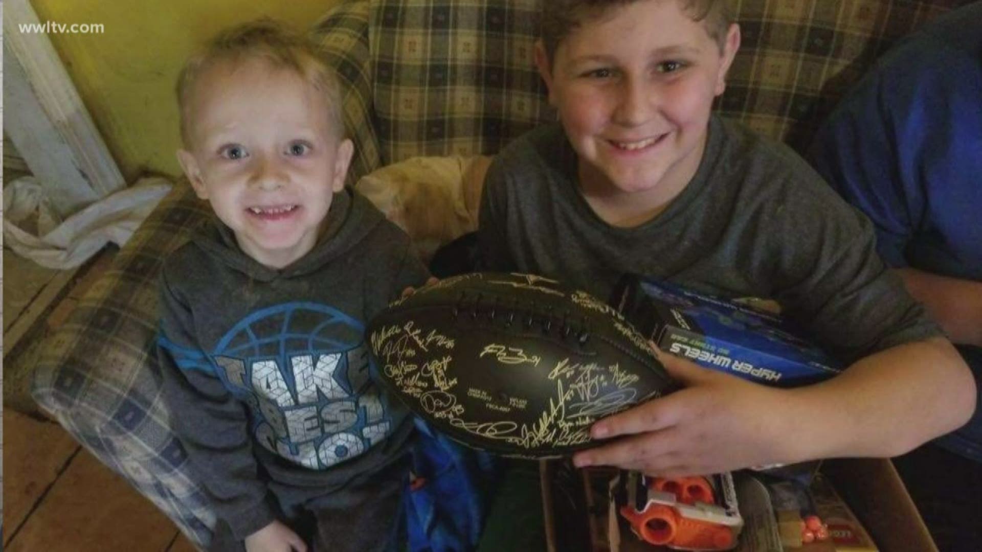 One of the gifts the kids got was a football signed by the Saints players. Gayle Benson, the Louisiana State Troopers Association and many more gave to the family.