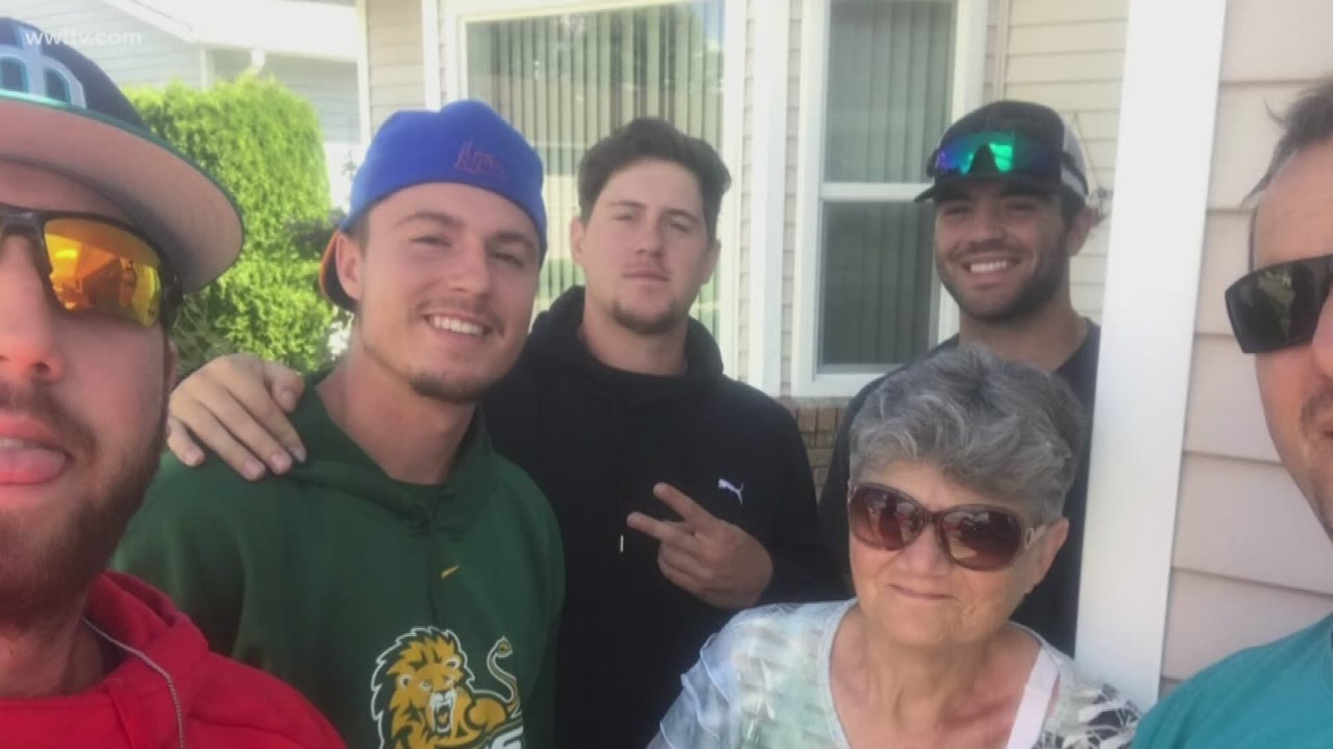 I group of baseball players, including three who play at Southeastern, are being called heroes after saving a woman from a burning car while on the road to Canada.