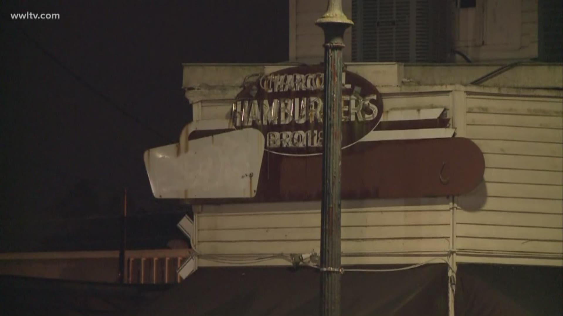The iconic Bud's Broiler sign on City Park Avenue is now covered, reading only: Charcoal hamburgers broiled.