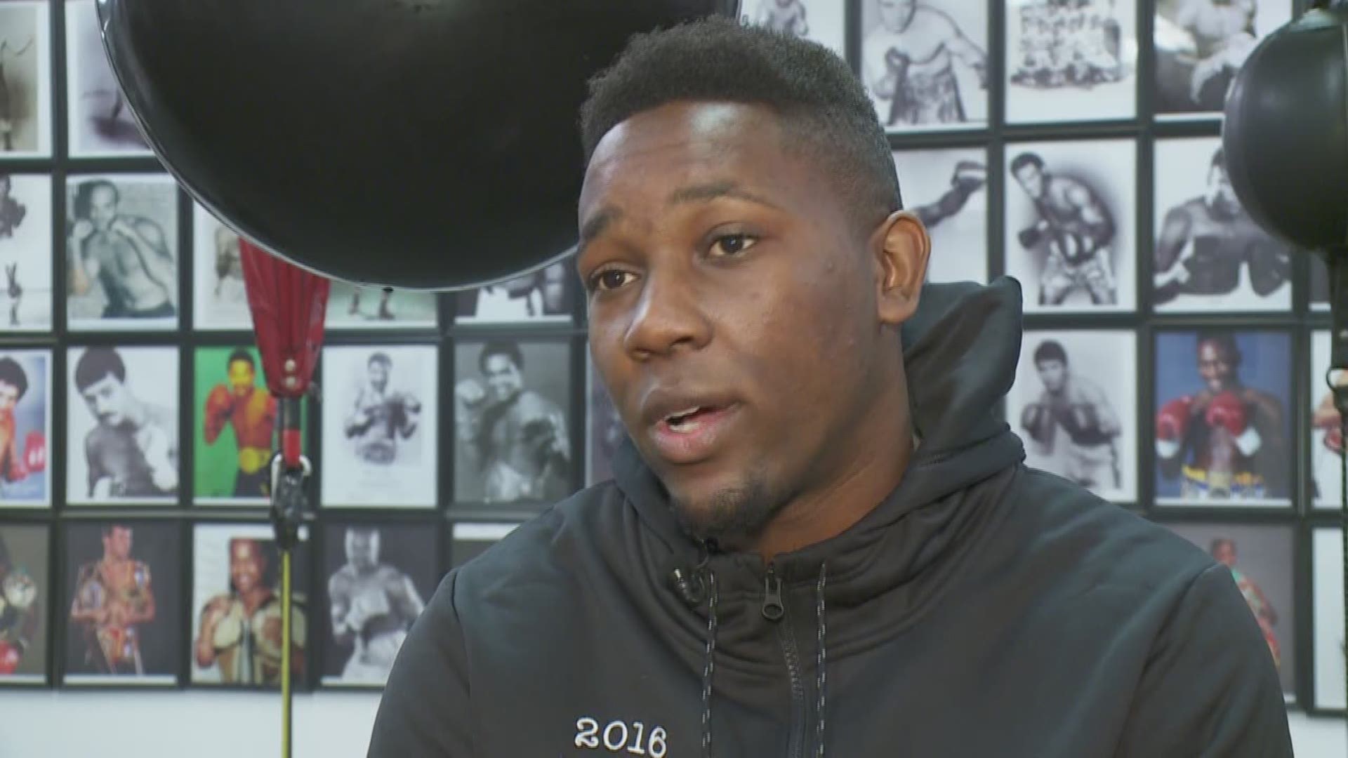 Leslie Spoon talks to a local amateur boxer who made the USA National Team.