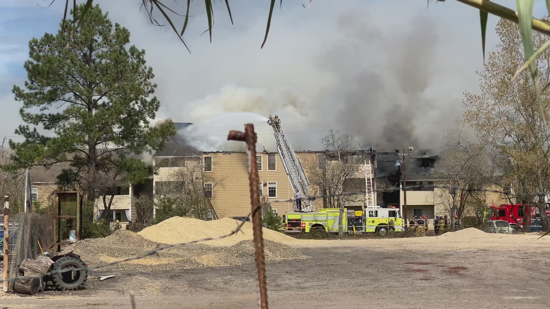 At least four people have been rescued from a fire at a Mandeville apartment complex Sunday, according to firefighters.  Video from Donald Marsh.