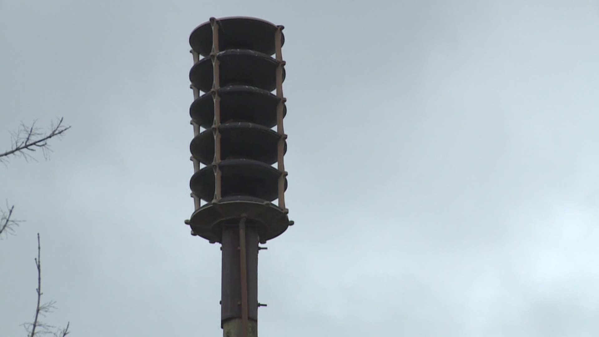 Tania Dall talks to parish officials about why a warning siren system isn't used for severe weather events.