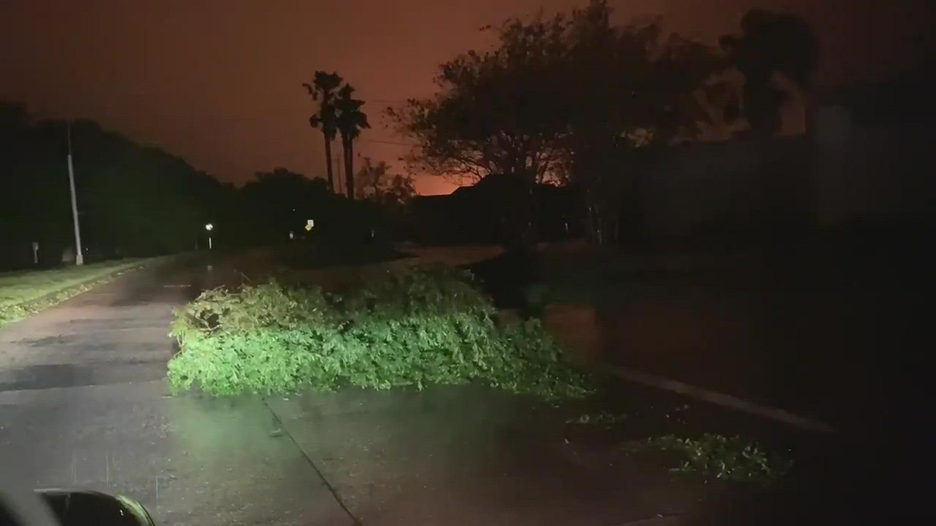 Down powerlines and trees plague the area.