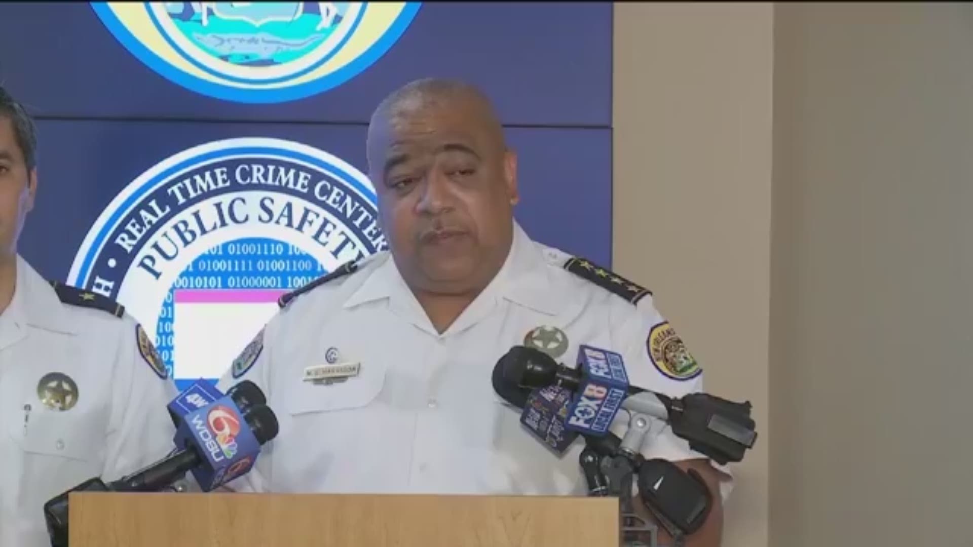 Chief Michael Harrison praised his officers for de-escalating the situation and remaining calm, even after learning one of the suspects was armed.